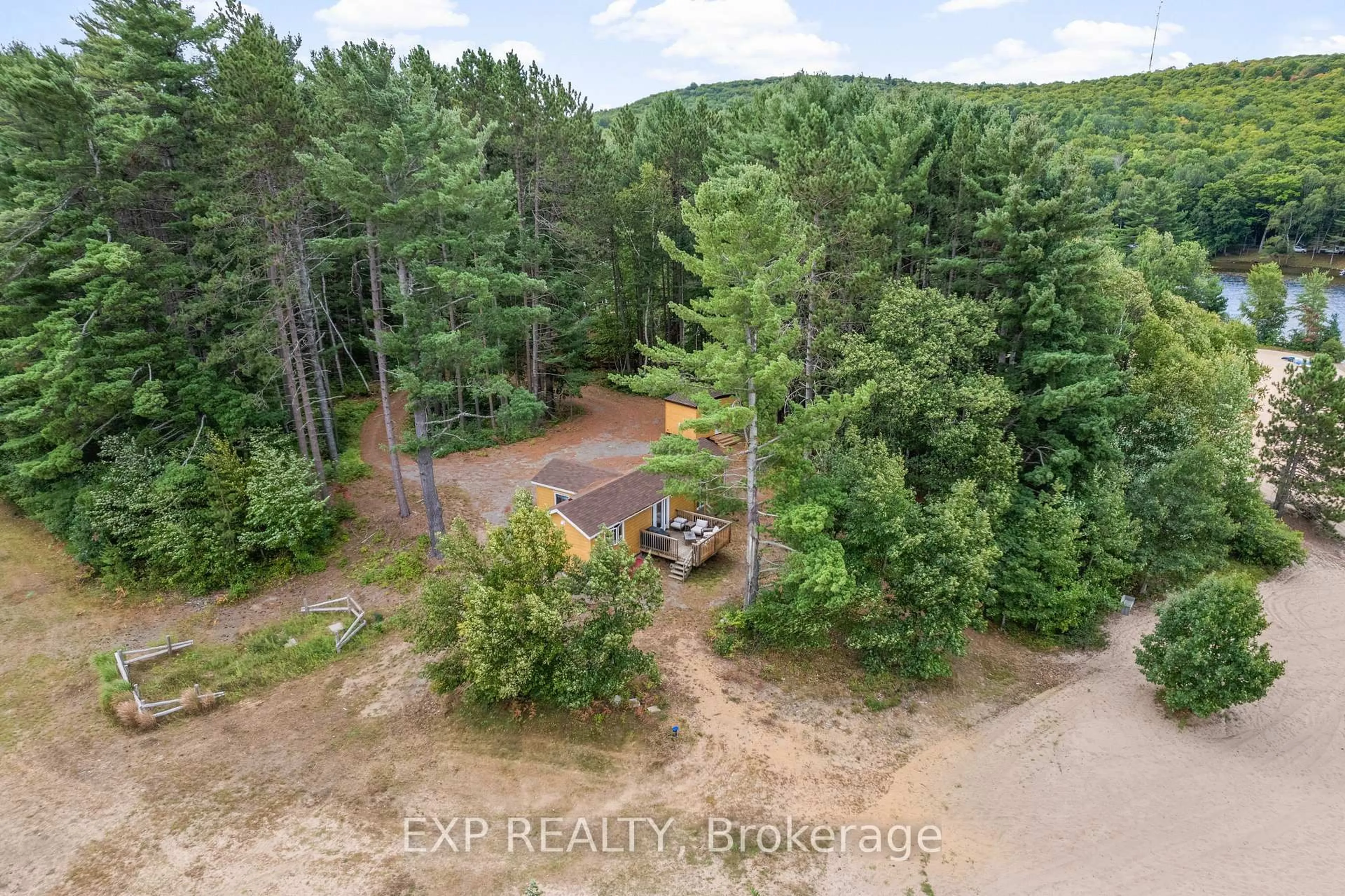 A pic from outside/outdoor area/front of a property/back of a property/a pic from drone, forest/trees view for 148 Sandy Shores Tr, Barry's Bay Ontario K0J 1B0