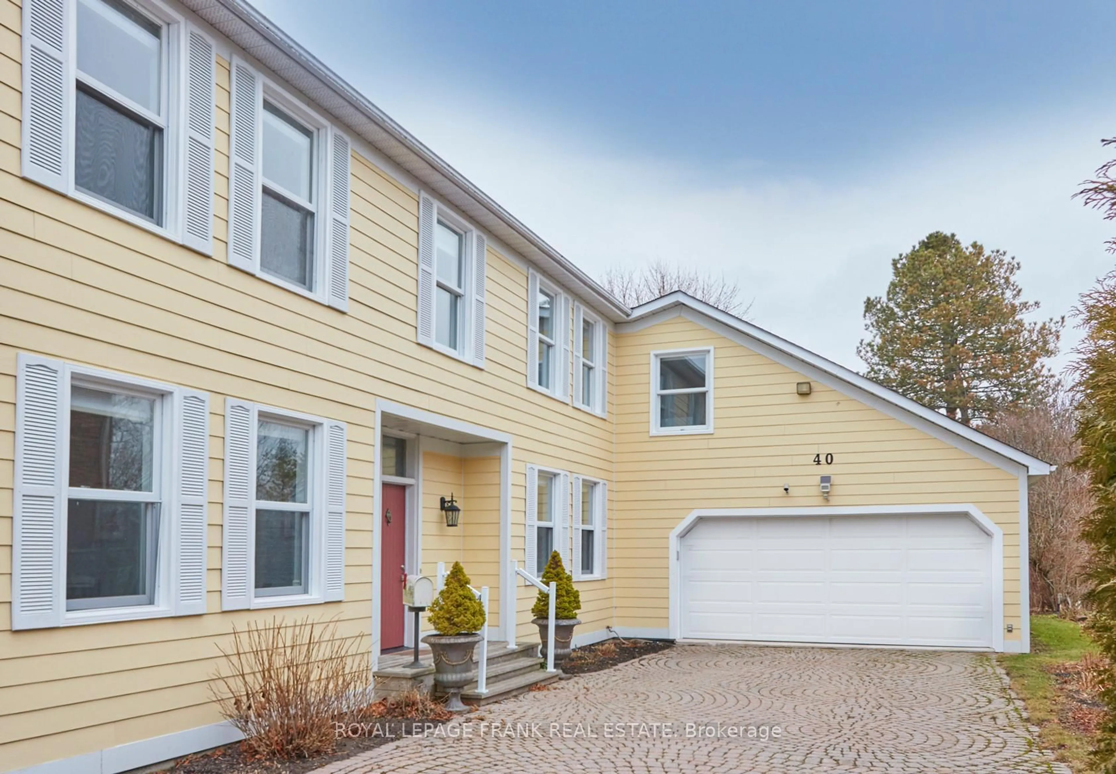 Home with vinyl exterior material, street for 40 Tremaine Terr, Cobourg Ontario K9A 5A8