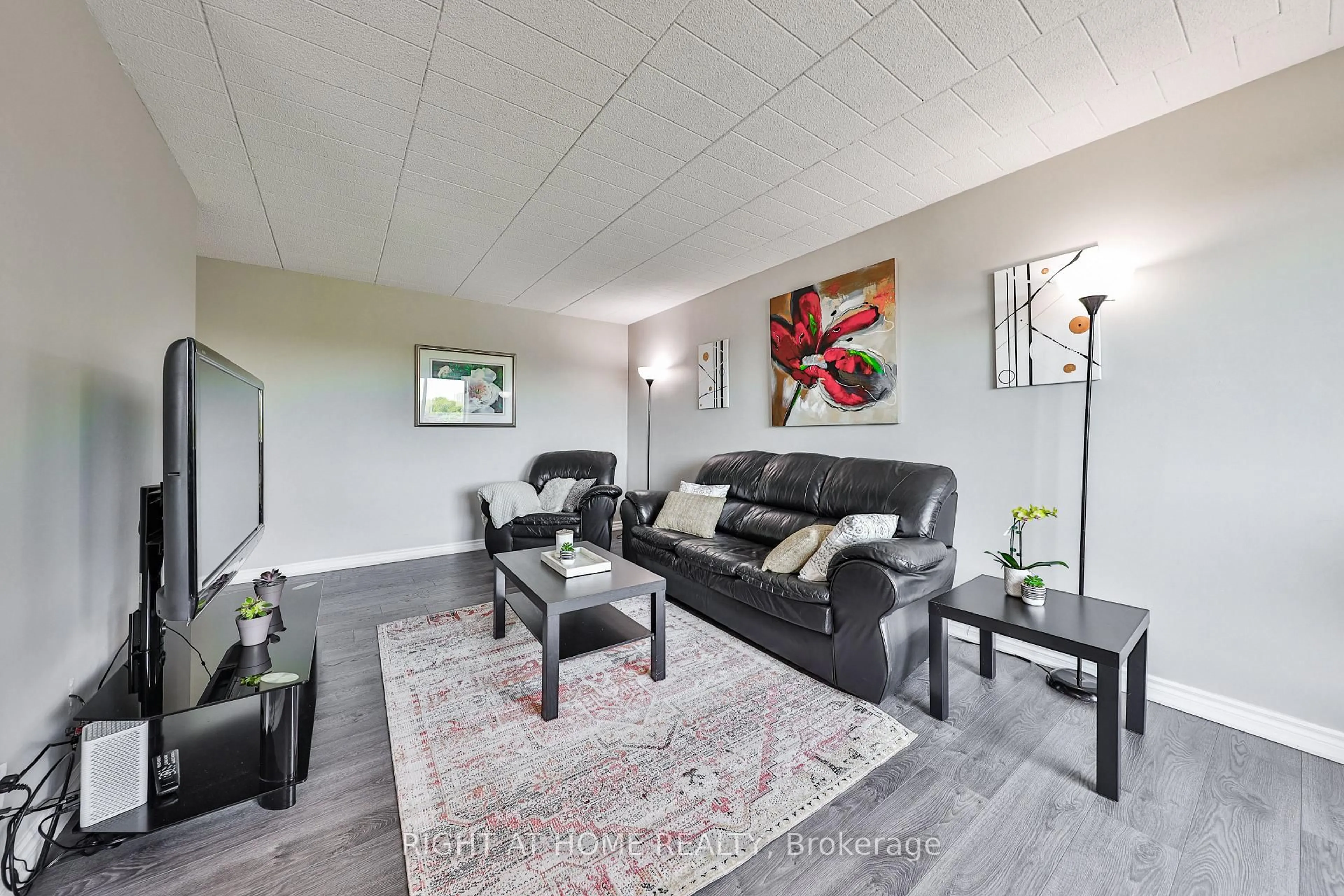 Living room with furniture, wood/laminate floor for 29 West Ave #411, Kitchener Ontario N2M 5E4