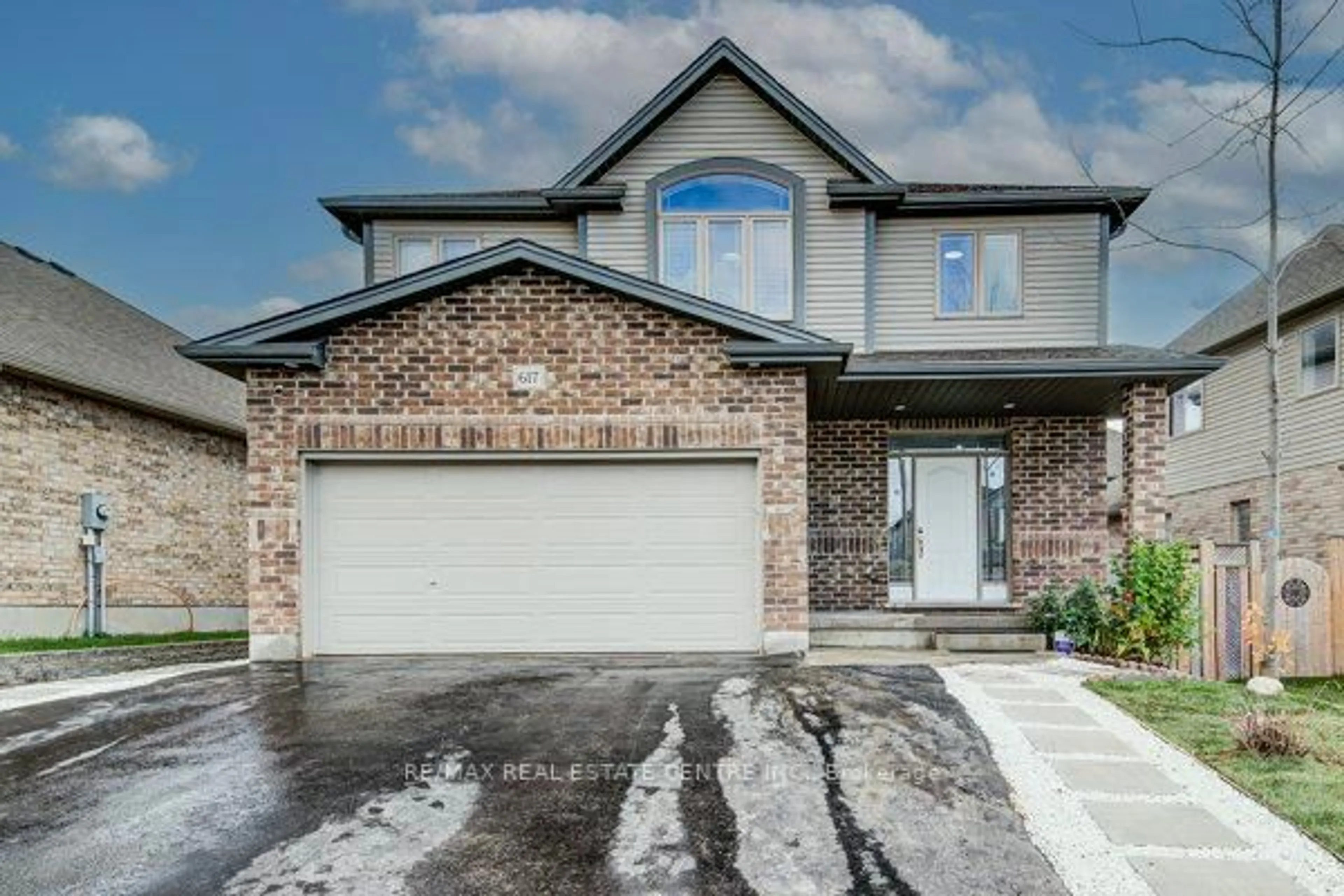 Home with brick exterior material, street for 617 Thorndale Dr, Waterloo Ontario N2T 0A9