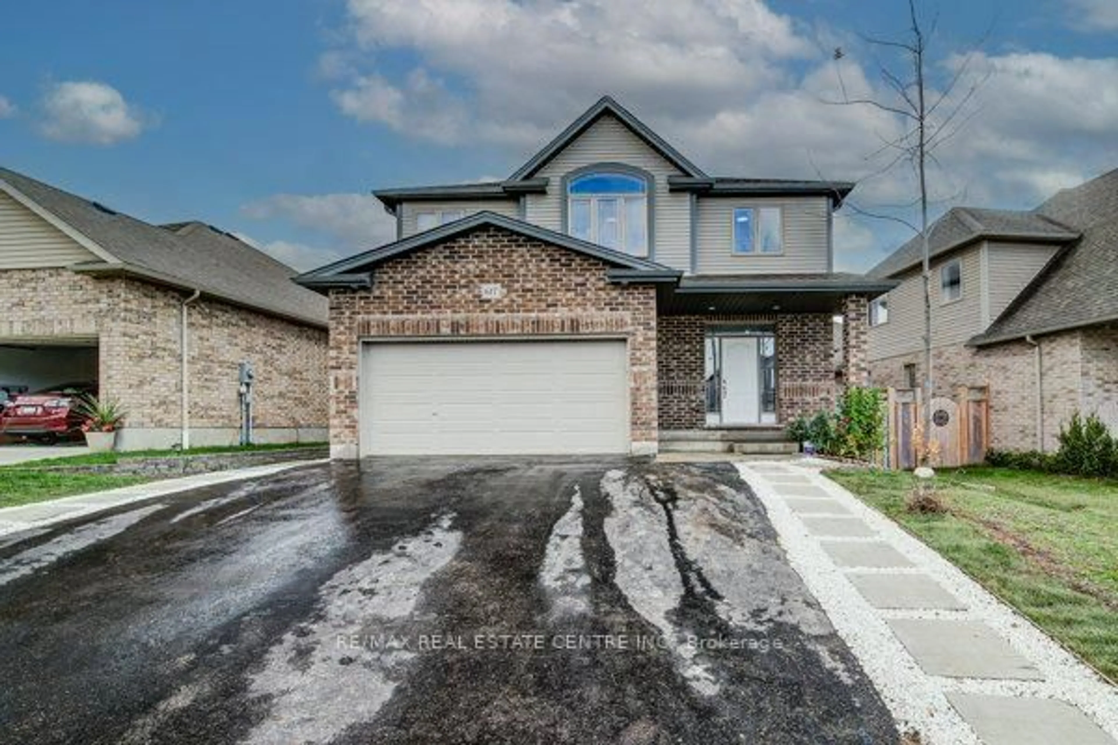 Home with brick exterior material, street for 617 Thorndale Dr, Waterloo Ontario N2T 0A9