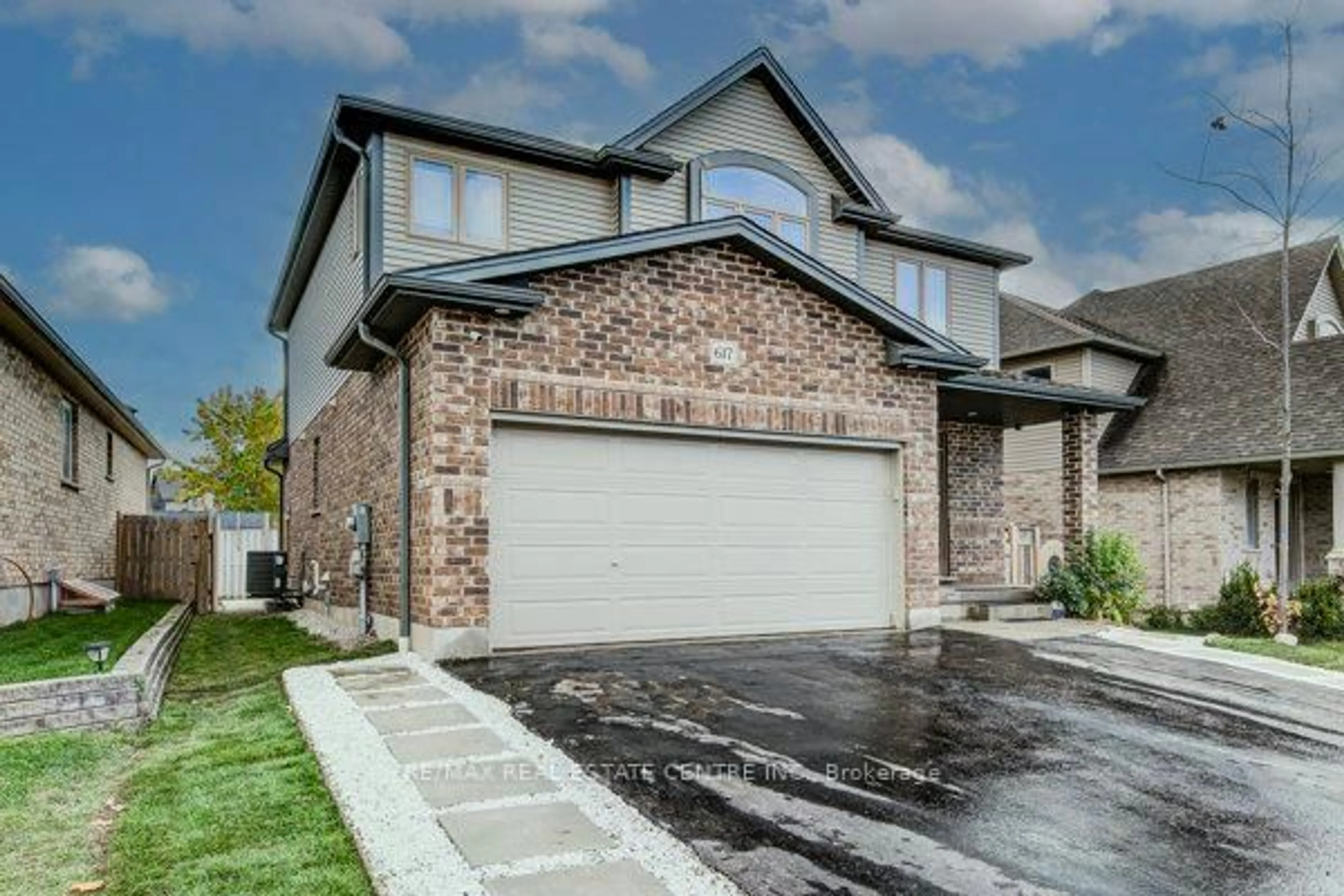 Home with brick exterior material, street for 617 Thorndale Dr, Waterloo Ontario N2T 0A9
