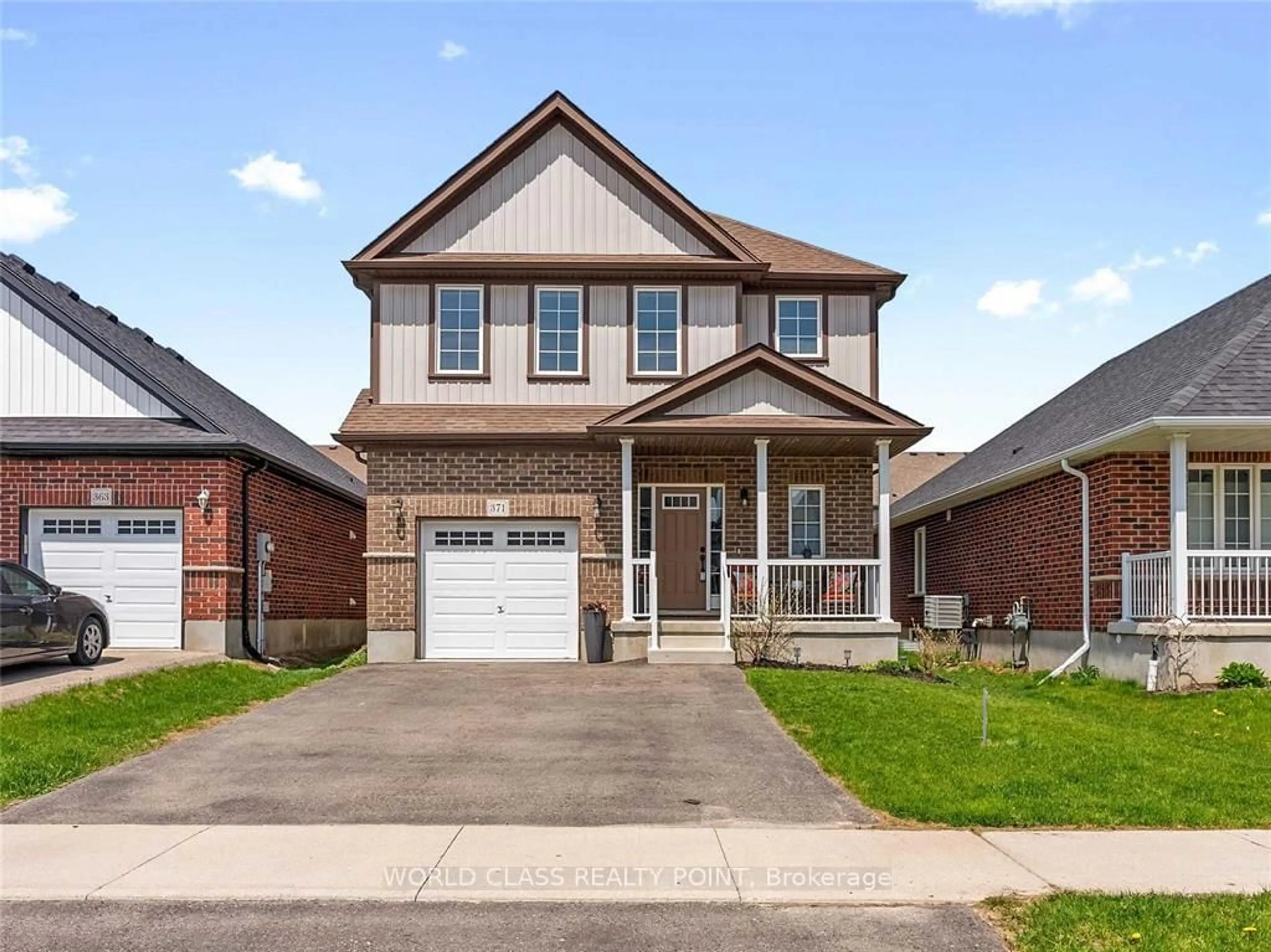 Home with brick exterior material, street for 371 Finoro Cres, Woolwich Ontario N3B 0C4