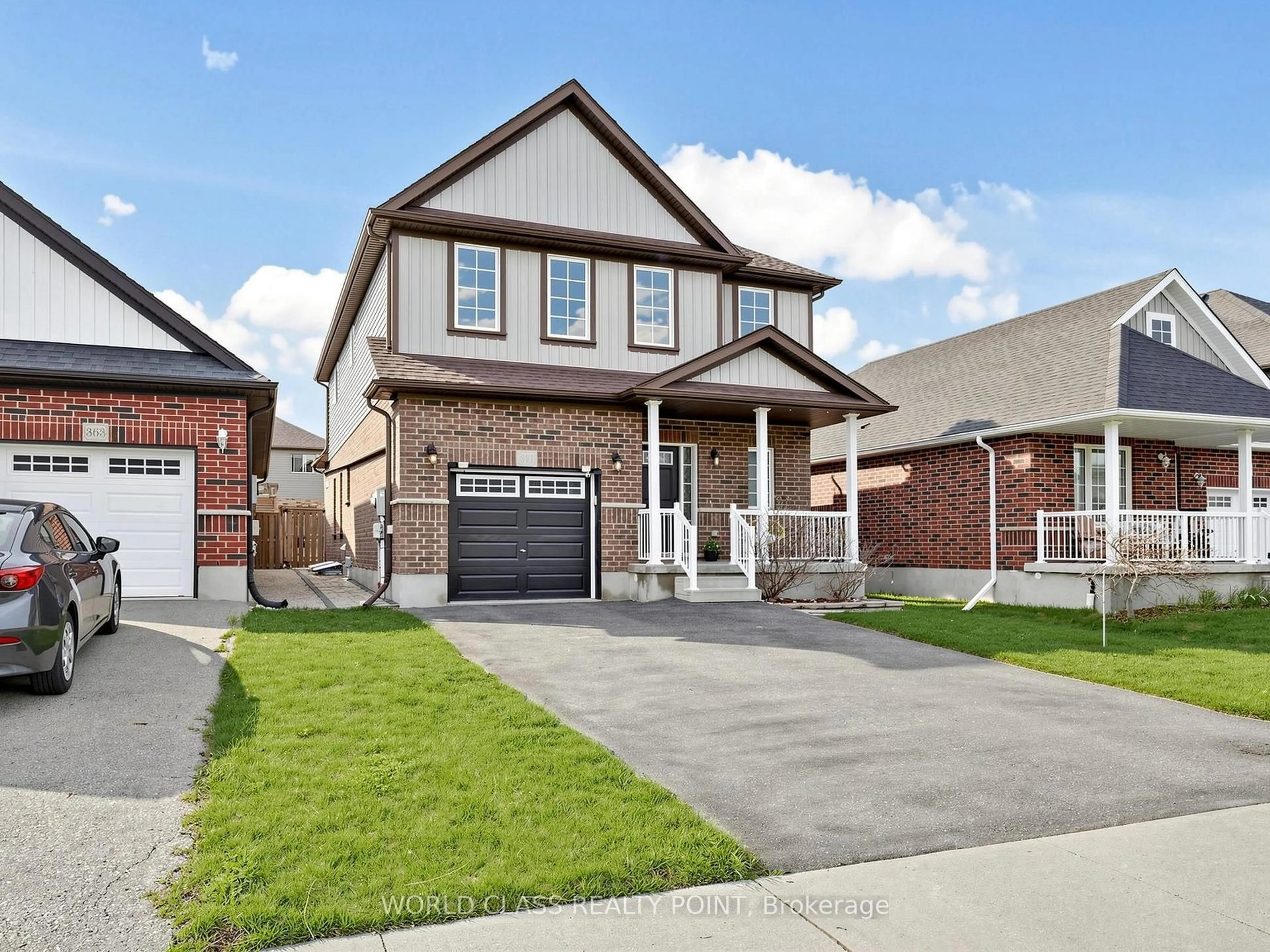 Home with brick exterior material, street for 371 Finoro Cres, Woolwich Ontario N3B 0C4