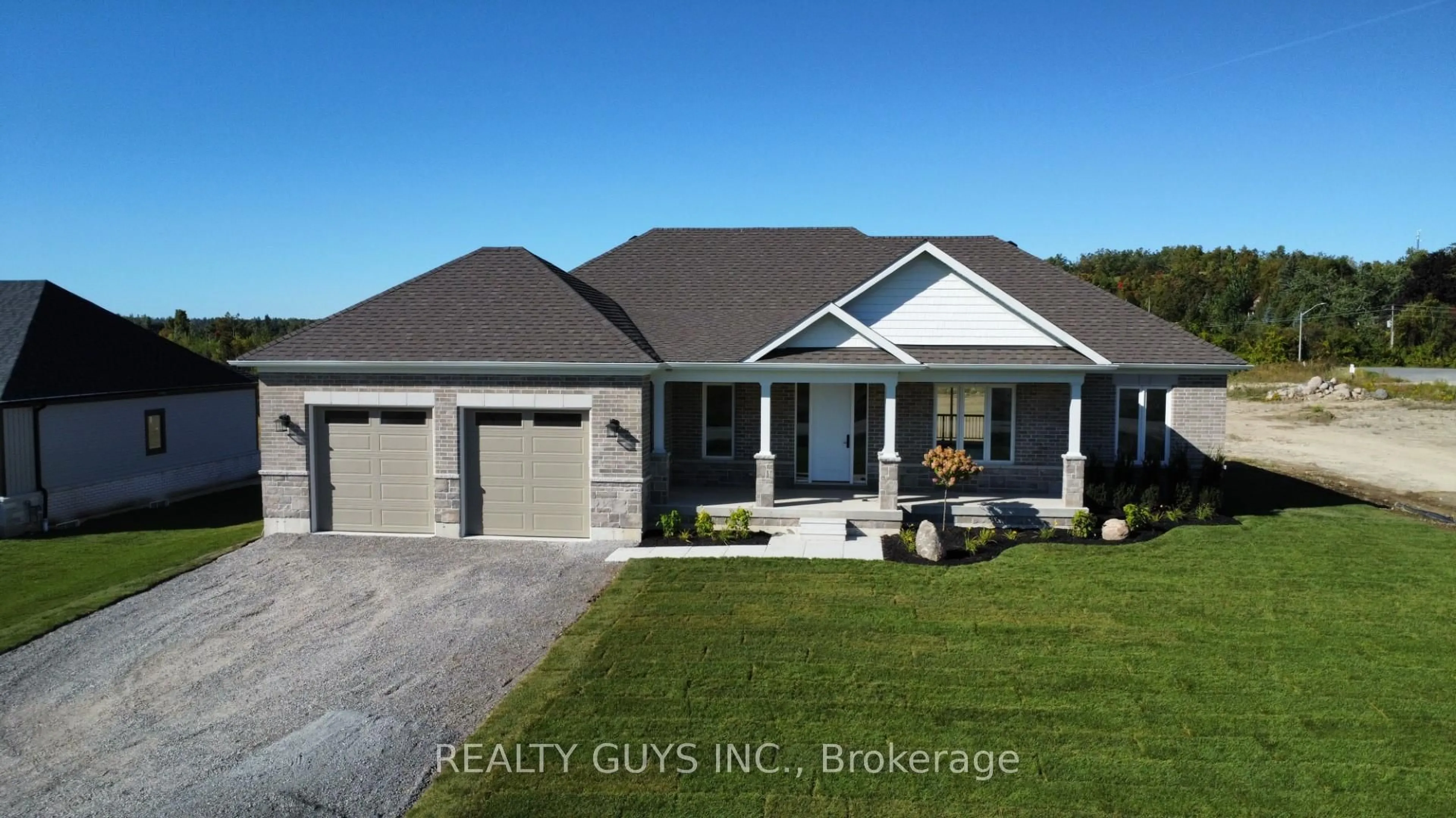 Home with brick exterior material, building for 2418 GWENDOLYN Crt, Cavan Monaghan Ontario L0A 1C0