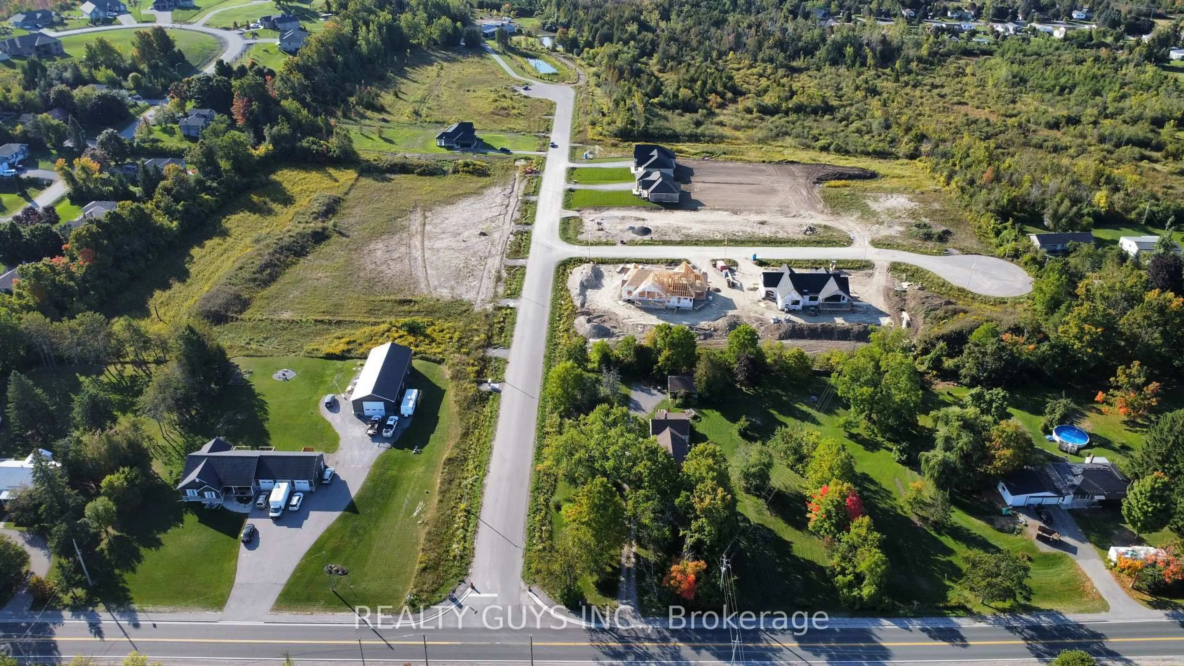 A pic from outside/outdoor area/front of a property/back of a property/a pic from drone, water/lake/river/ocean view for 2418 GWENDOLYN Crt, Cavan Monaghan Ontario L0A 1C0