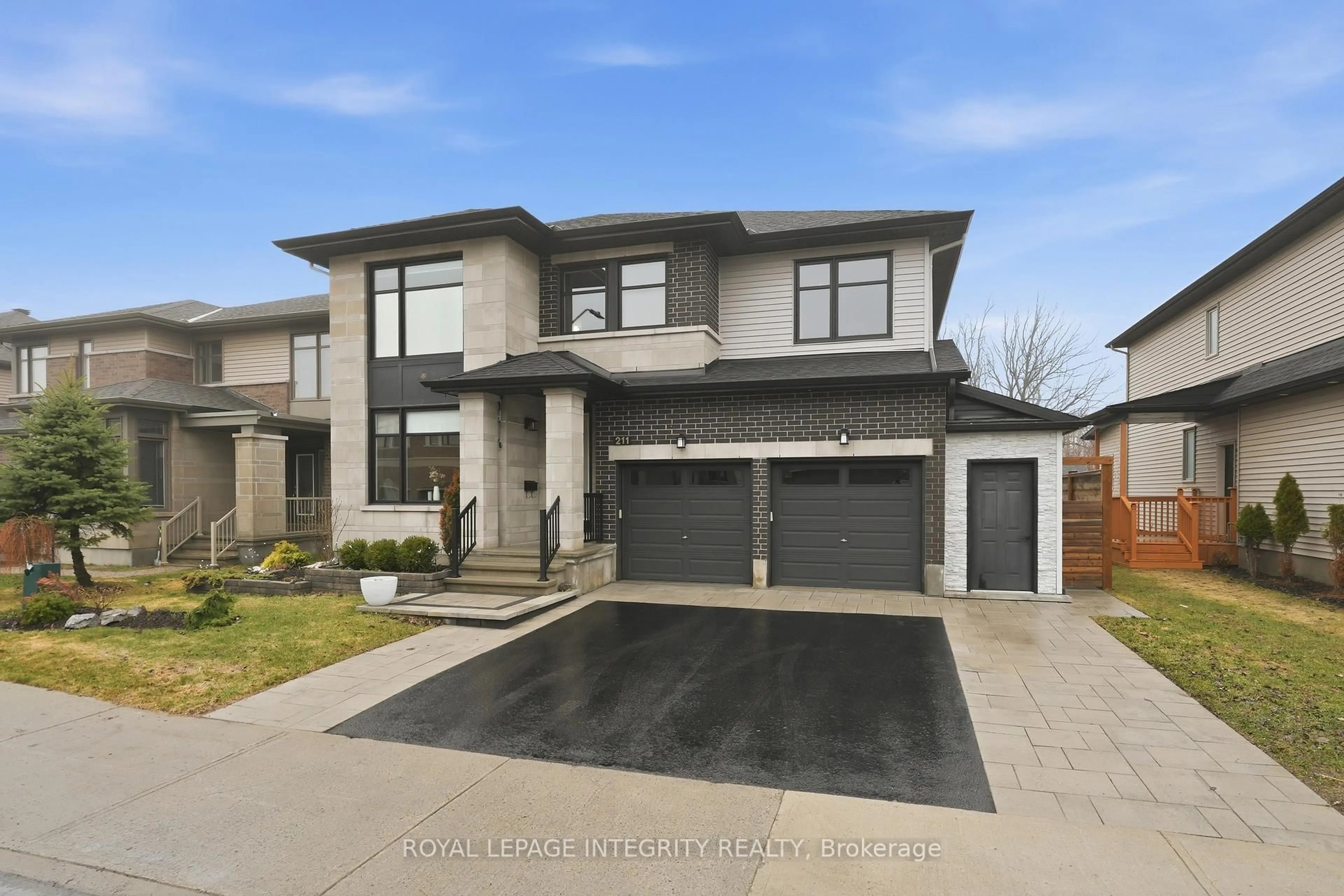Home with brick exterior material, street for 211 Cooks Mill Cres, Ottawa Ontario K1V 2N1