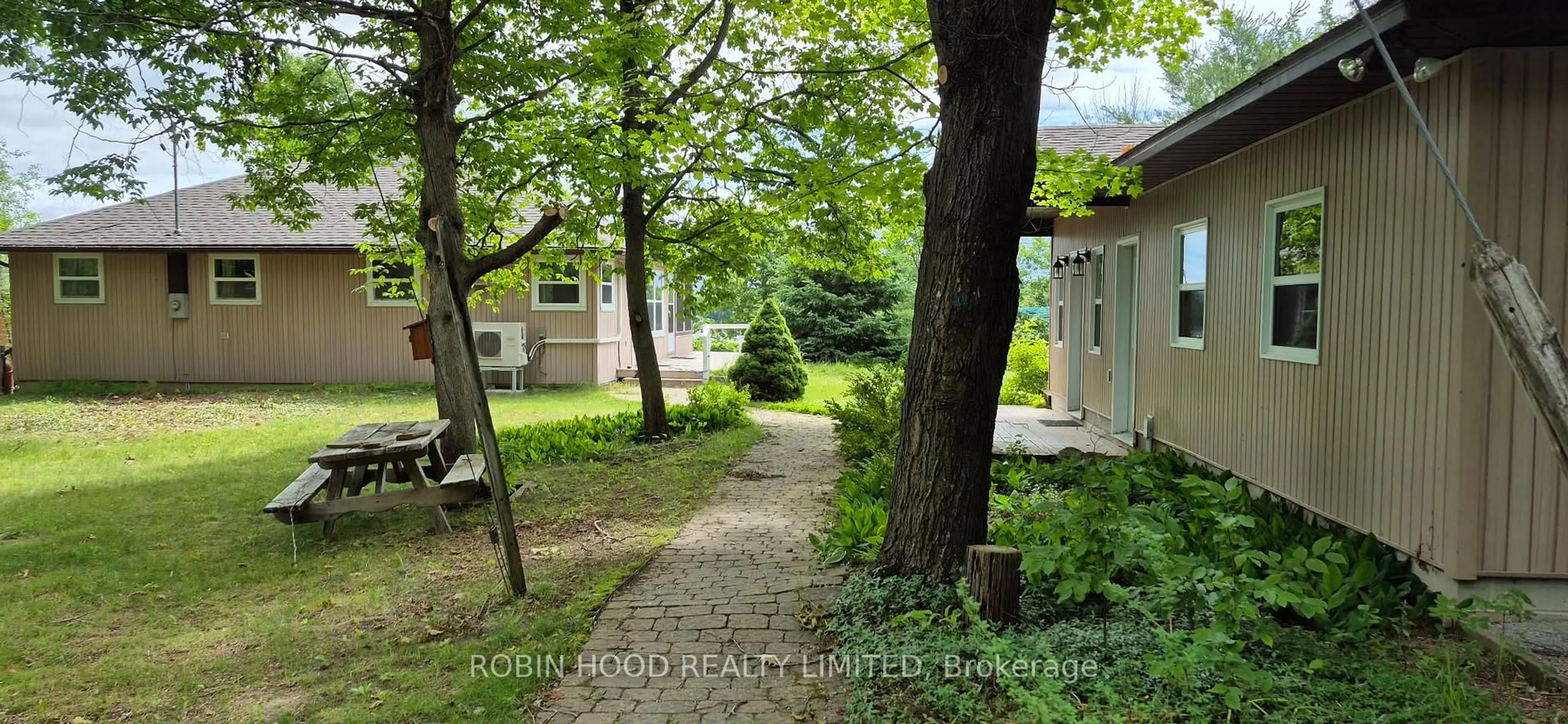 Patio, street for 211 Mcbride Point Dr, Rideau Lakes Ontario K0G 1X0