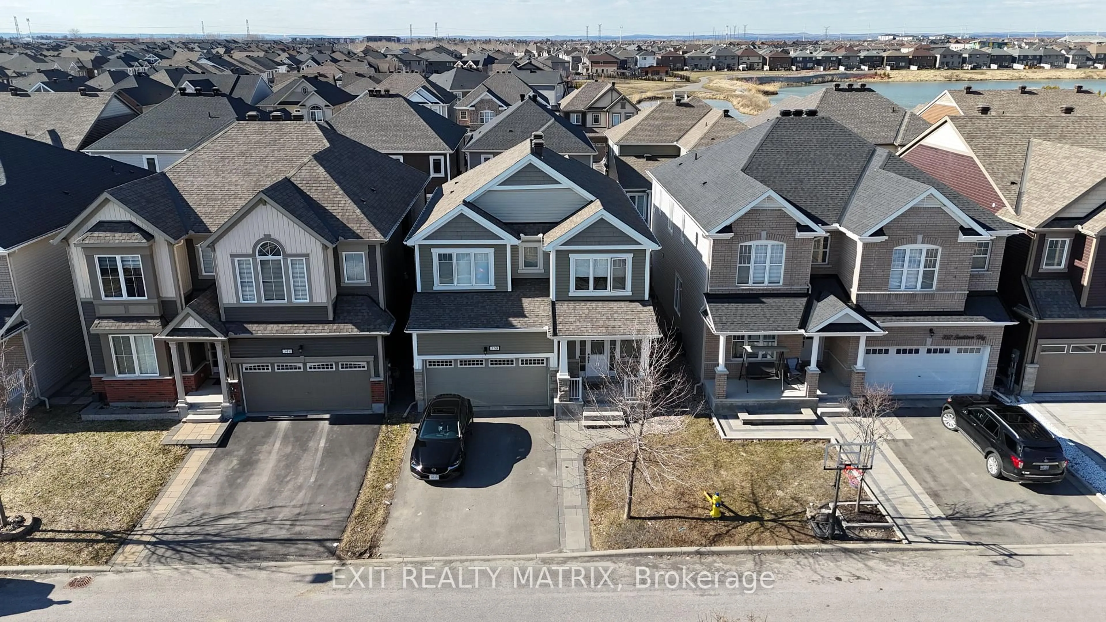 A pic from outside/outdoor area/front of a property/back of a property/a pic from drone, street for 350 Sweetclover Way, Ottawa Ontario K4A 1E6