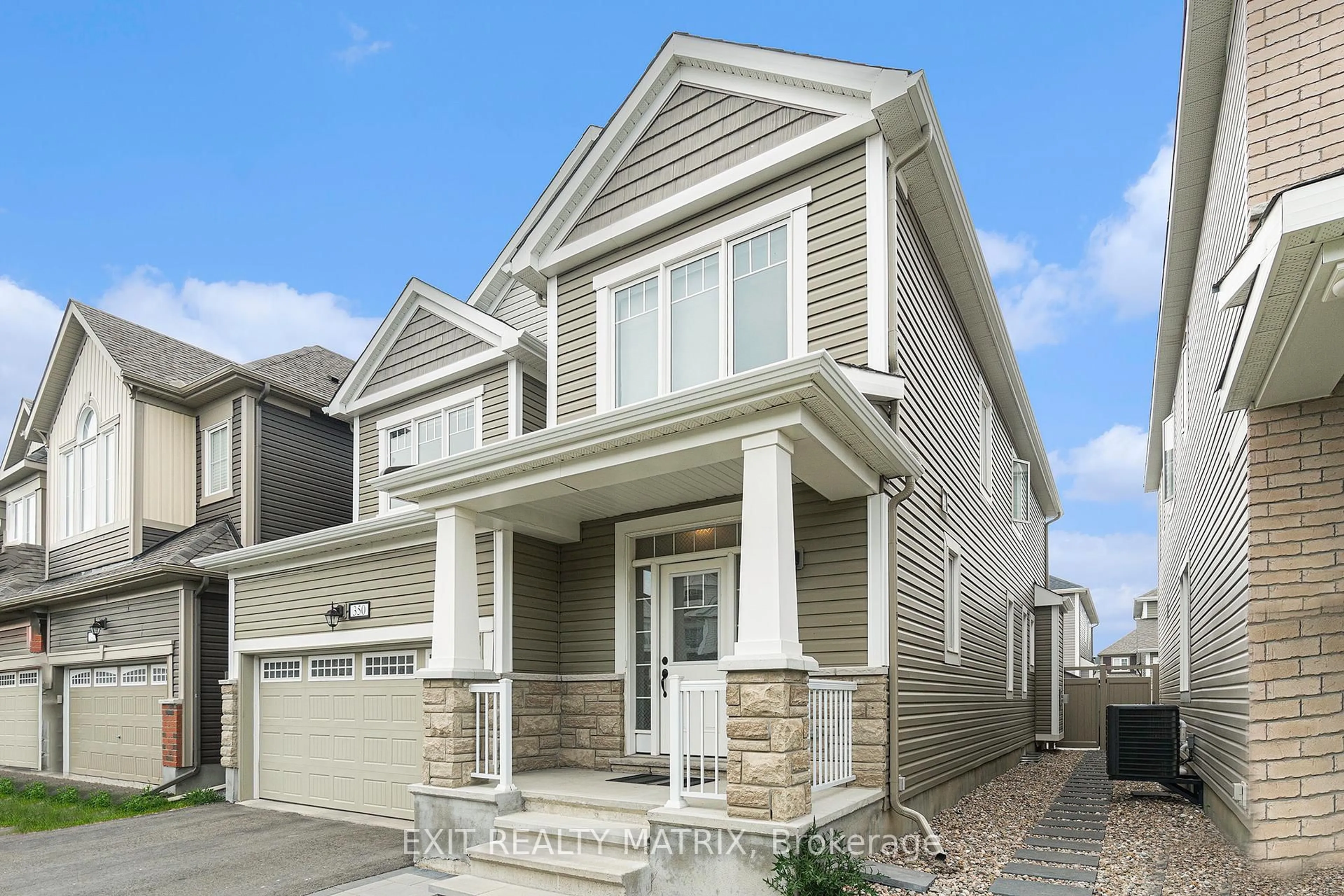 Home with vinyl exterior material, street for 350 Sweetclover Way, Ottawa Ontario K4A 1E6