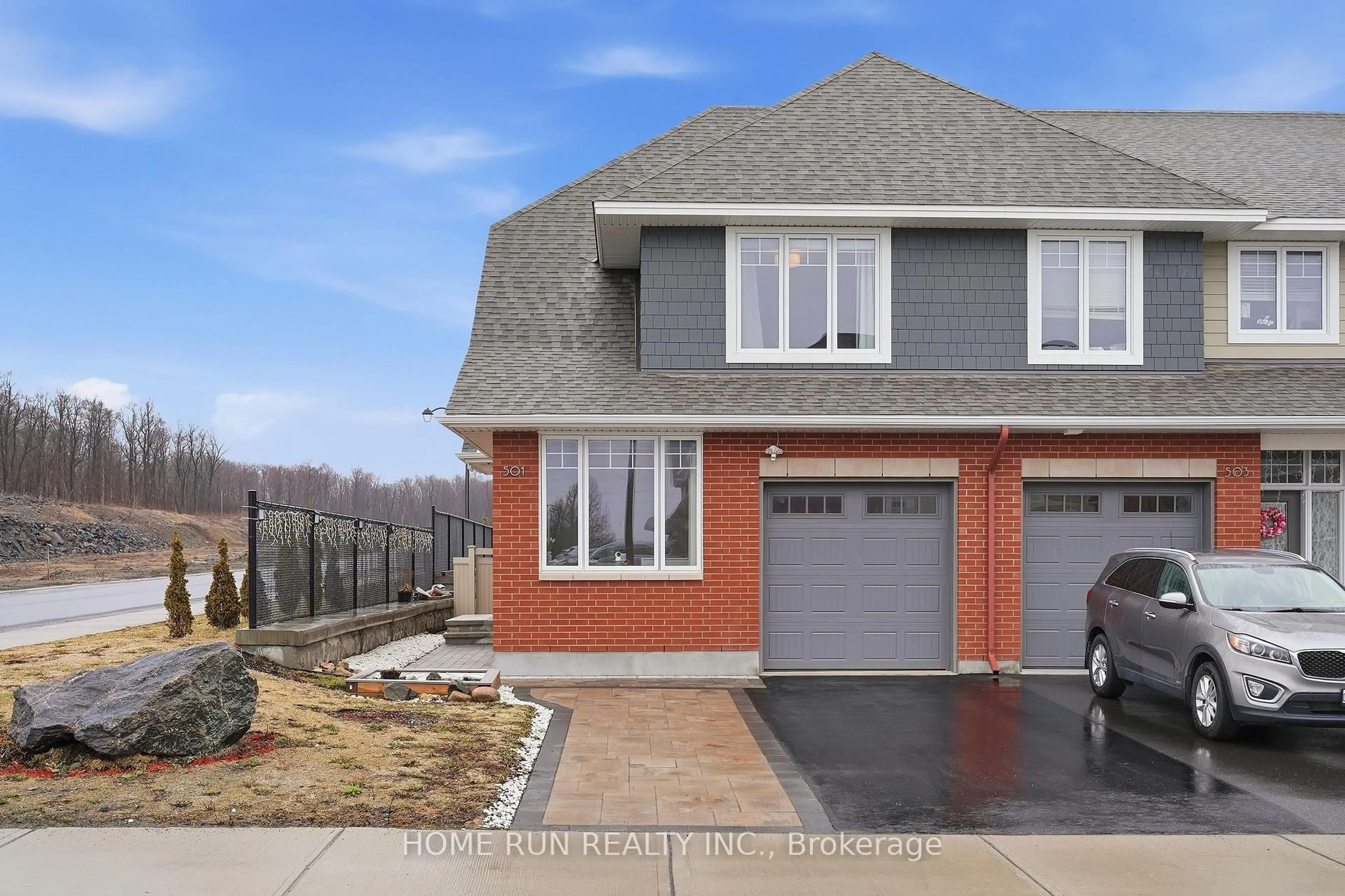 Home with brick exterior material, street for 501 Hitzlay Terr, Ottawa Ontario K2T 0R9