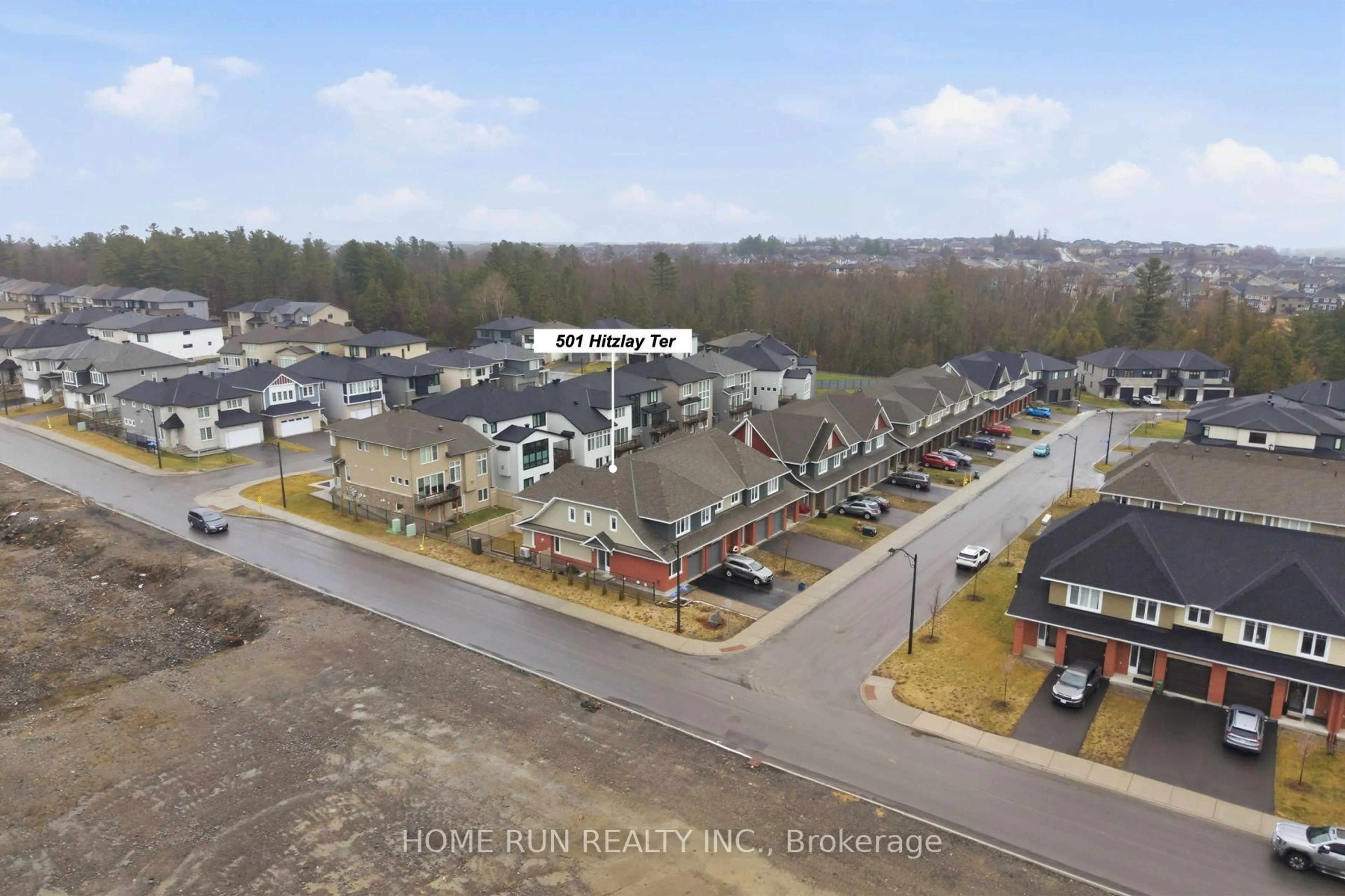 A pic from outside/outdoor area/front of a property/back of a property/a pic from drone, unknown for 501 Hitzlay Terr, Ottawa Ontario K2T 0R9