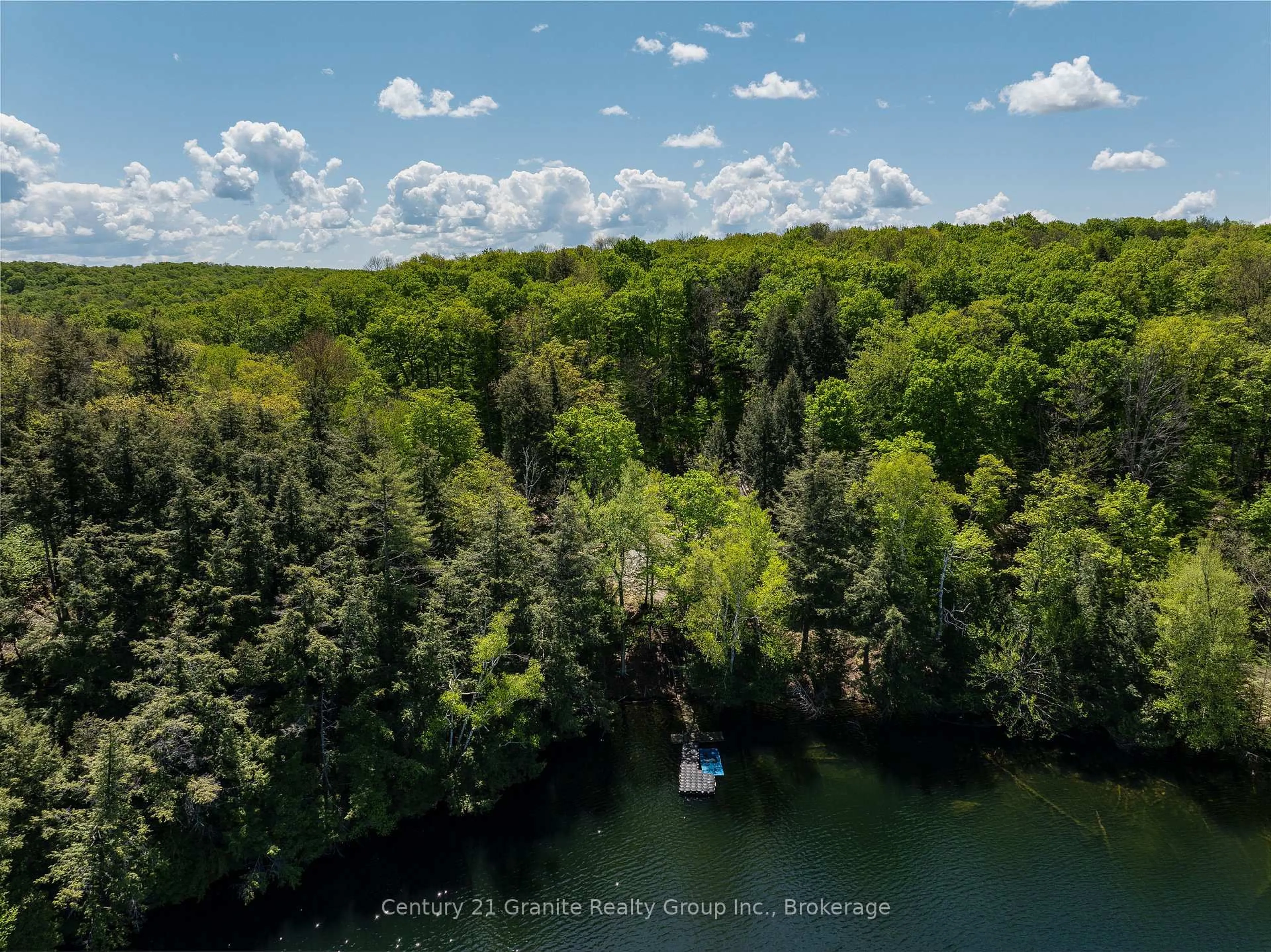 A pic from outside/outdoor area/front of a property/back of a property/a pic from drone, water/lake/river/ocean view for 1145 Mink Rd, Dysart et al Ontario K0M 1S0
