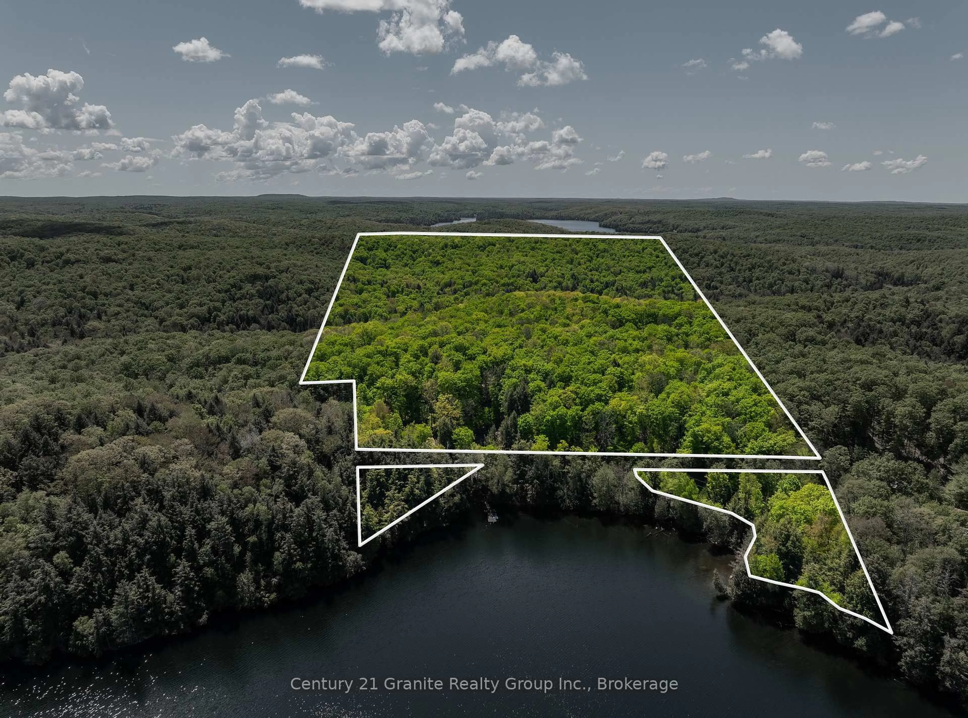 A pic from outside/outdoor area/front of a property/back of a property/a pic from drone, water/lake/river/ocean view for 1145 Mink Rd, Dysart et al Ontario K0M 1S0