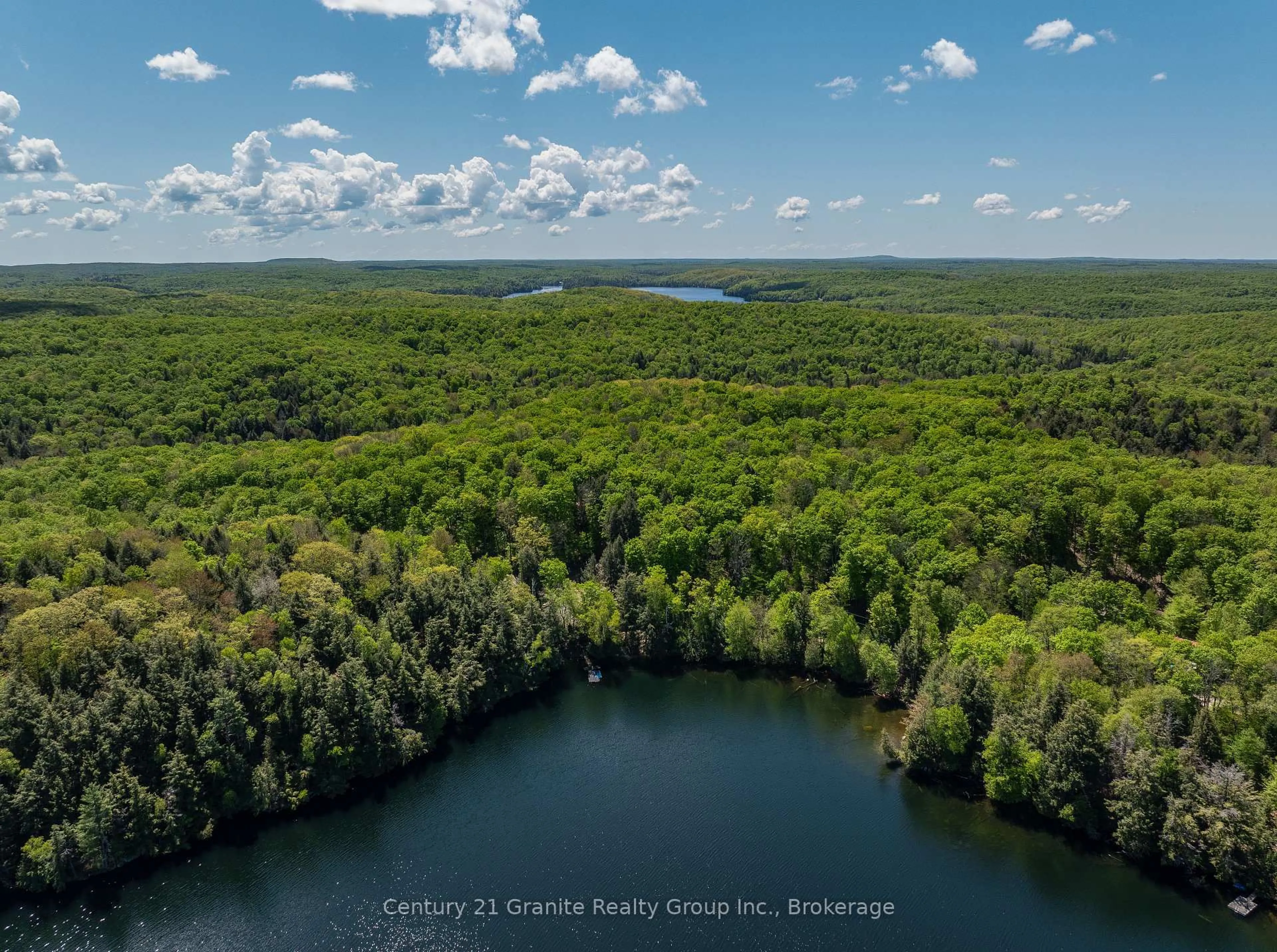 A pic from outside/outdoor area/front of a property/back of a property/a pic from drone, water/lake/river/ocean view for 1145 Mink Rd, Dysart et al Ontario K0M 1S0