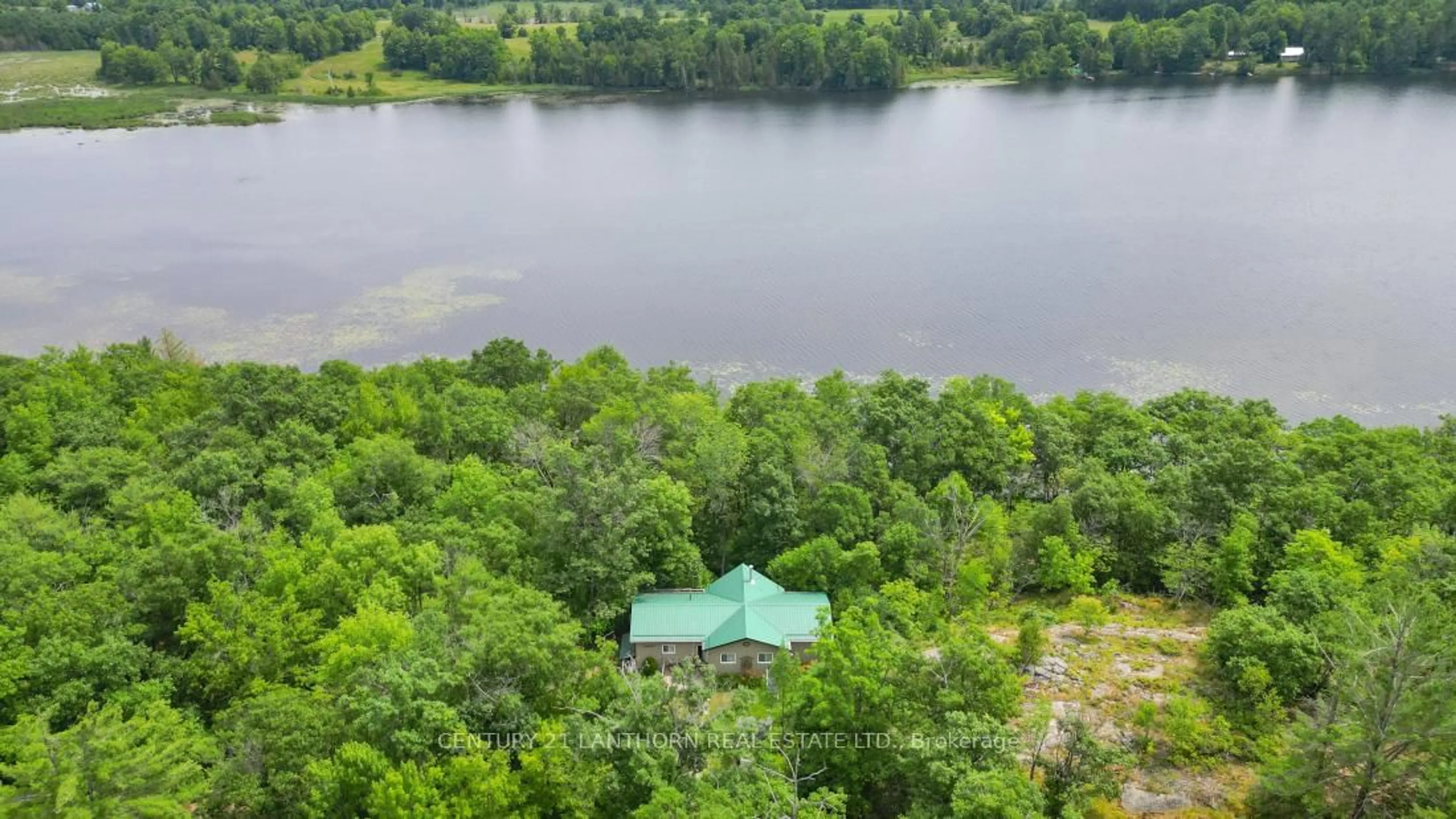 A pic from outside/outdoor area/front of a property/back of a property/a pic from drone, water/lake/river/ocean view for 656 A Yarrow Lane, Madoc Ontario K0K 2K0