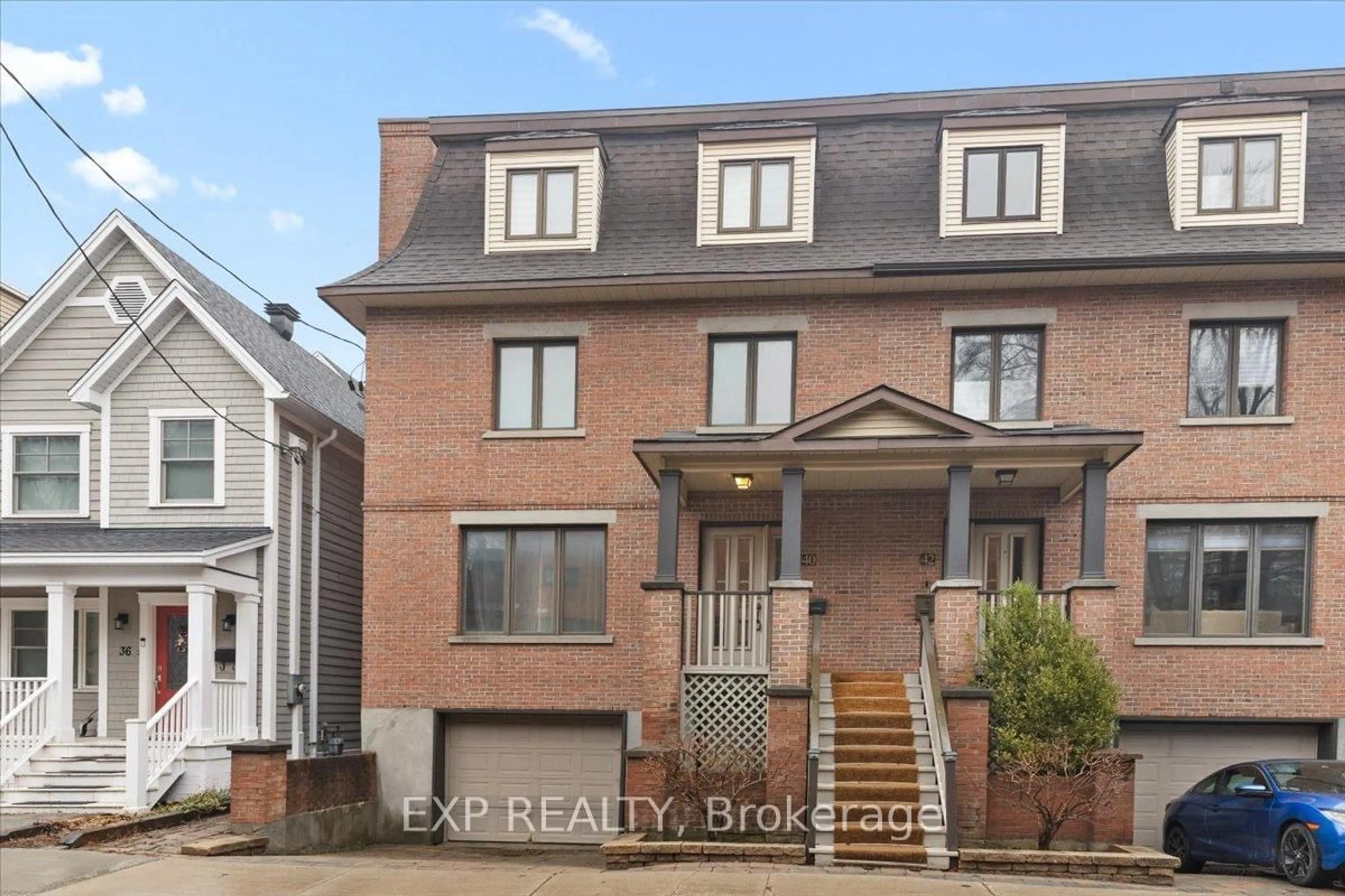 Home with brick exterior material, street for 40 Lewis St, Ottawa Ontario K2P 0S3