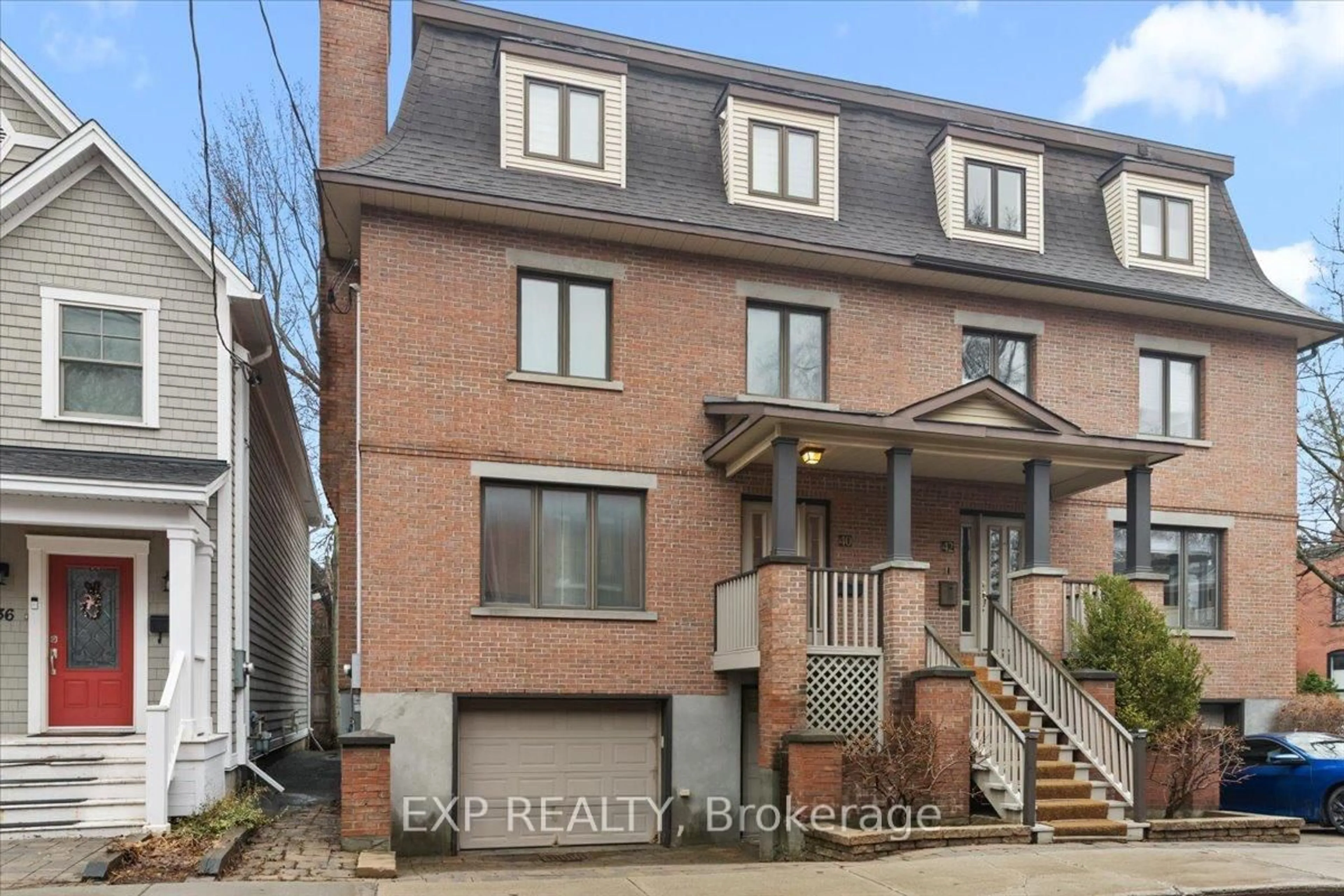 Home with brick exterior material, street for 40 Lewis St, Ottawa Ontario K2P 0S3