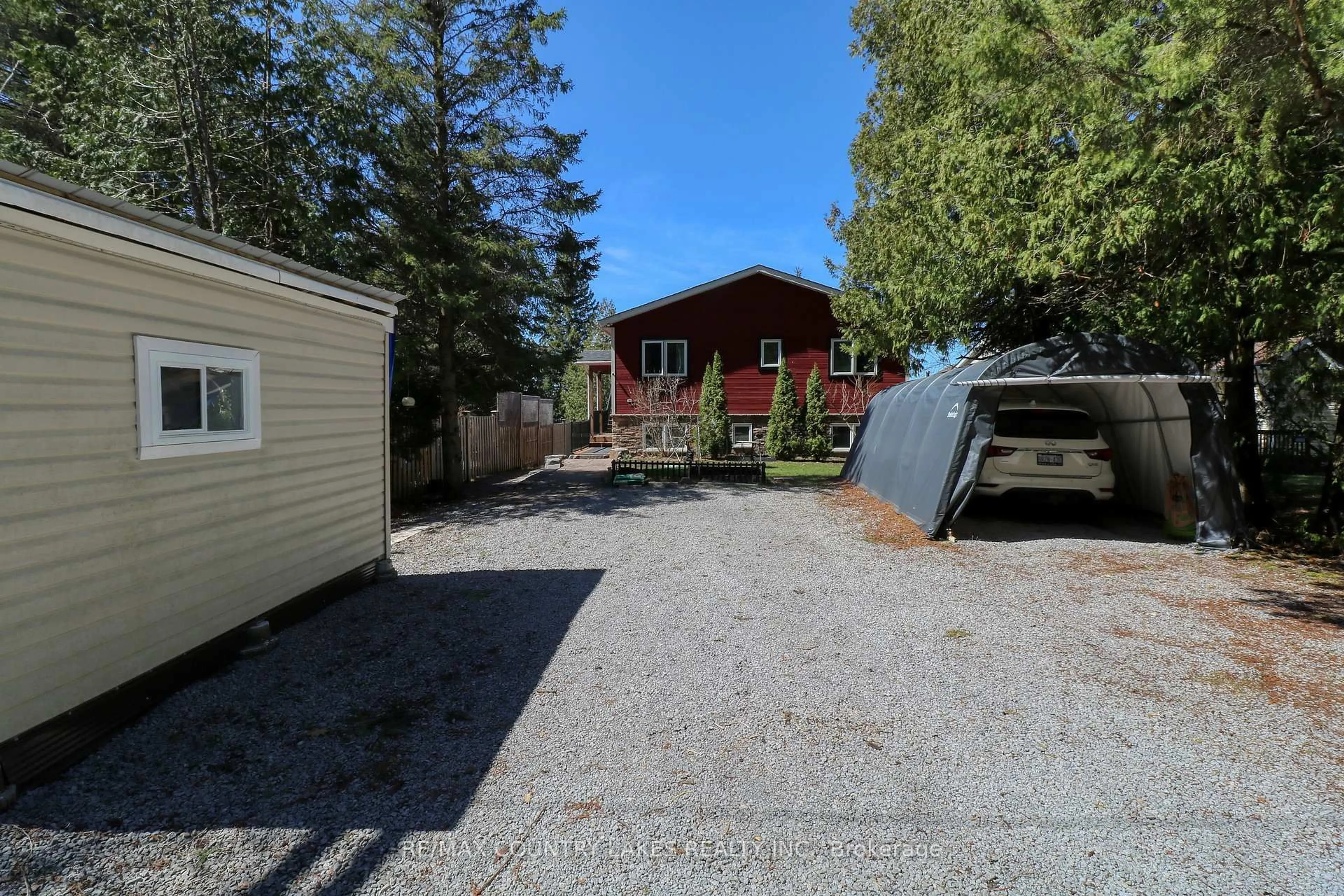 A pic from outside/outdoor area/front of a property/back of a property/a pic from drone, street for 87 Paradise Rd, Kawartha Lakes Ontario K0M 1B0