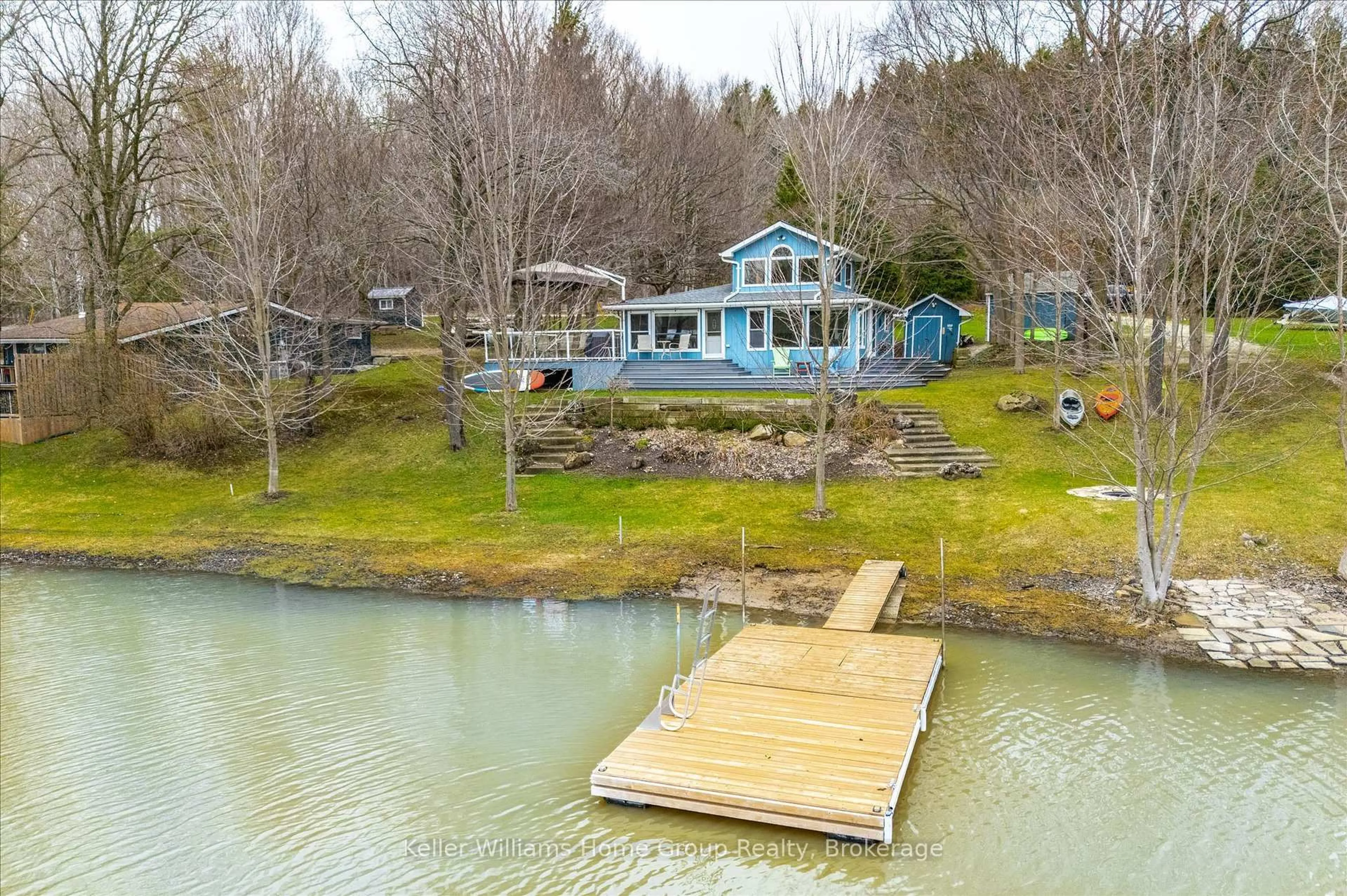 A pic from outside/outdoor area/front of a property/back of a property/a pic from drone, water/lake/river/ocean view for 973 Road 10 West, Mapleton Ontario N0G 1P0