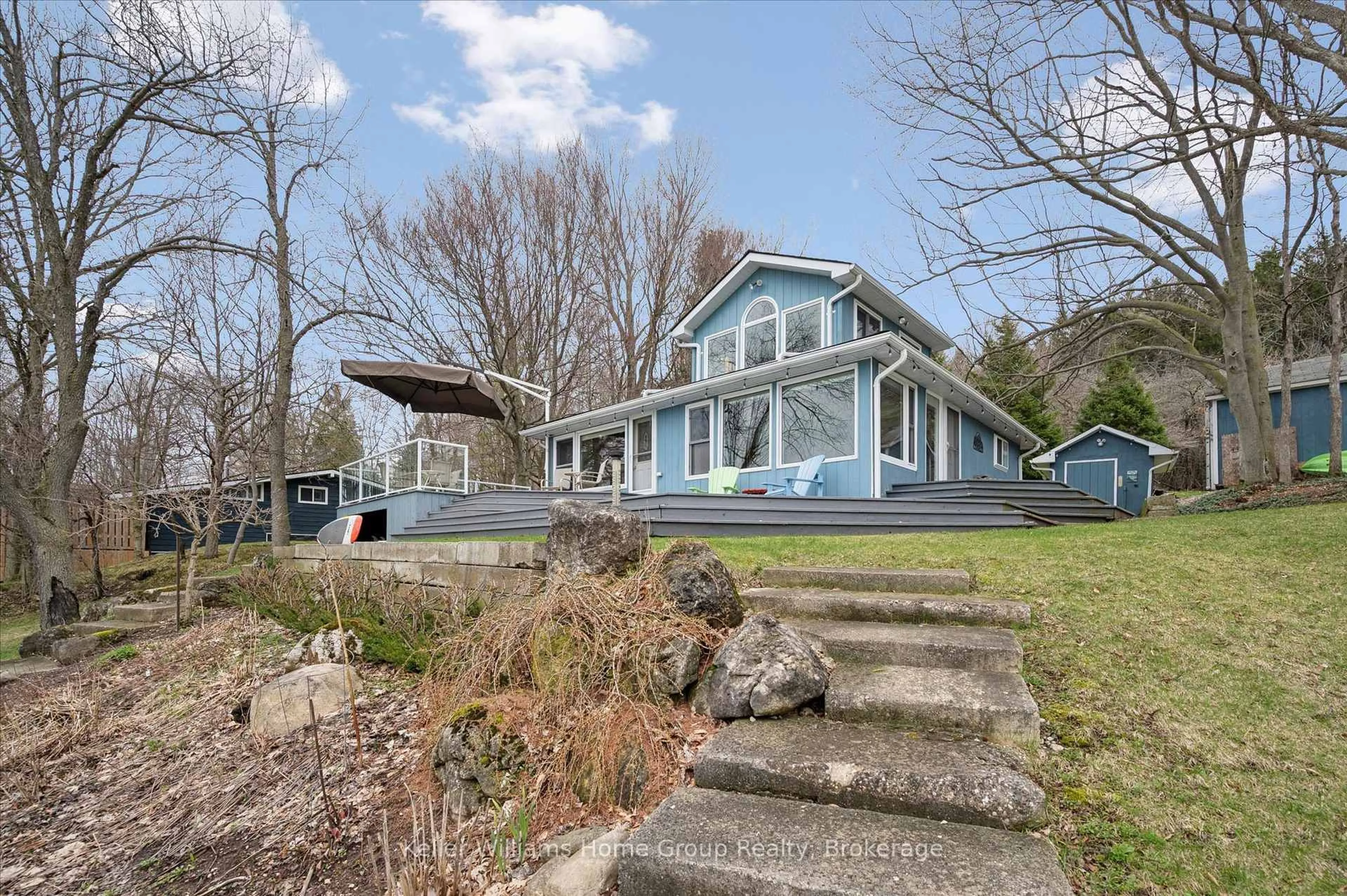 A pic from outside/outdoor area/front of a property/back of a property/a pic from drone, water/lake/river/ocean view for 973 Road 10 West, Mapleton Ontario N0G 1P0