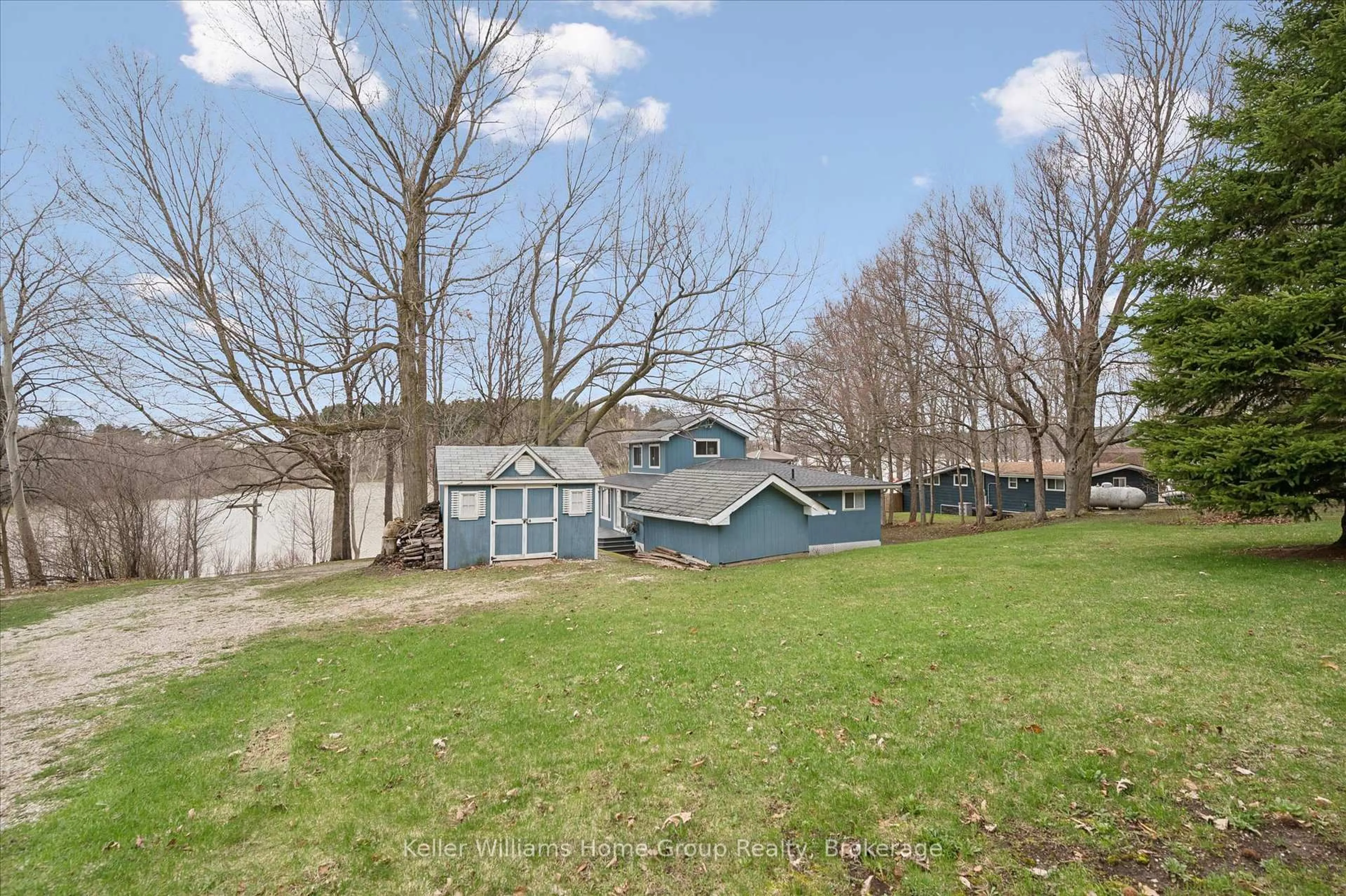 A pic from outside/outdoor area/front of a property/back of a property/a pic from drone, water/lake/river/ocean view for 973 Road 10 West, Mapleton Ontario N0G 1P0