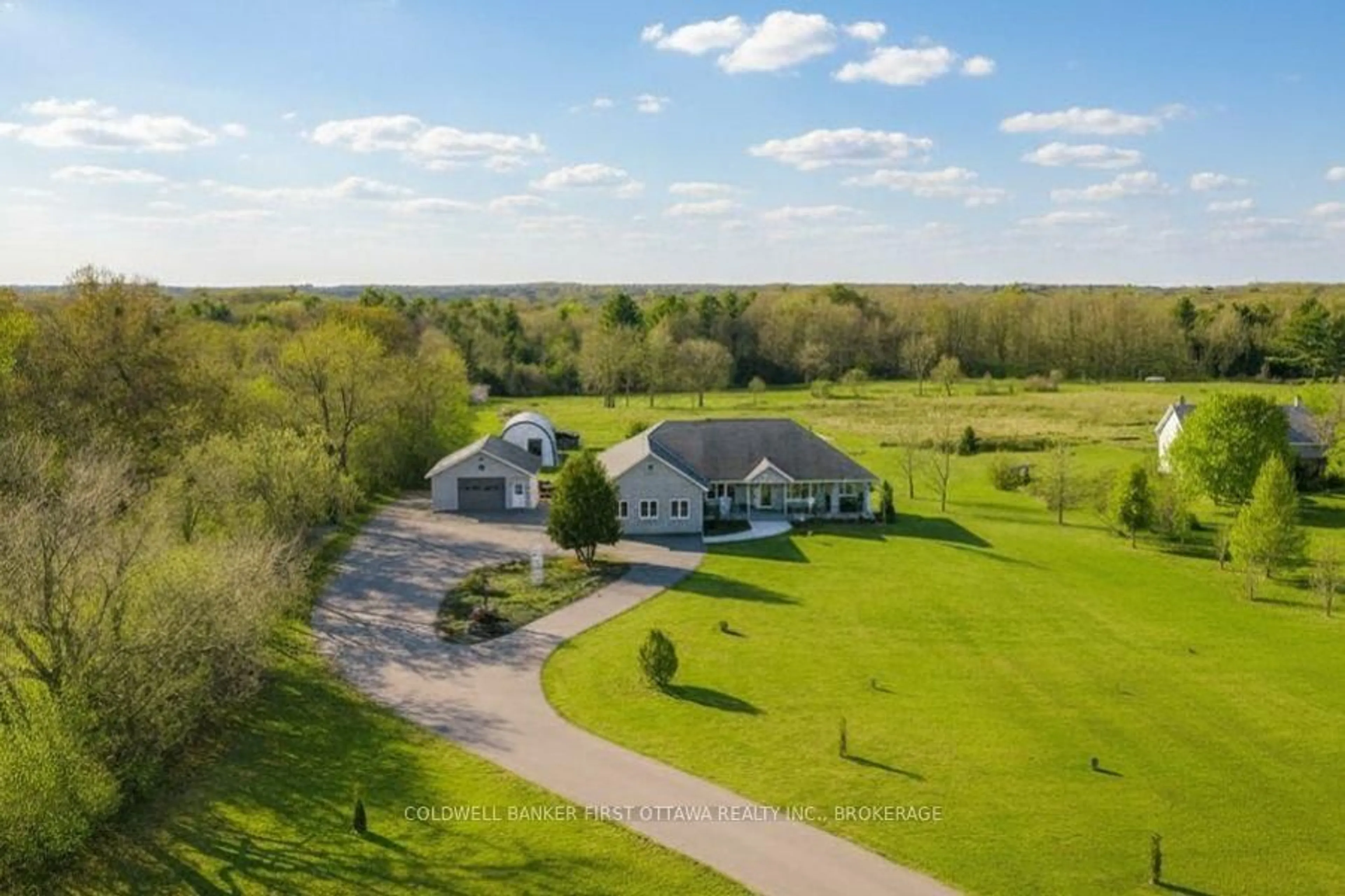 A pic from outside/outdoor area/front of a property/back of a property/a pic from drone, water/lake/river/ocean view for 4987 Bedford Rd, Picton Ontario K0K 2T0