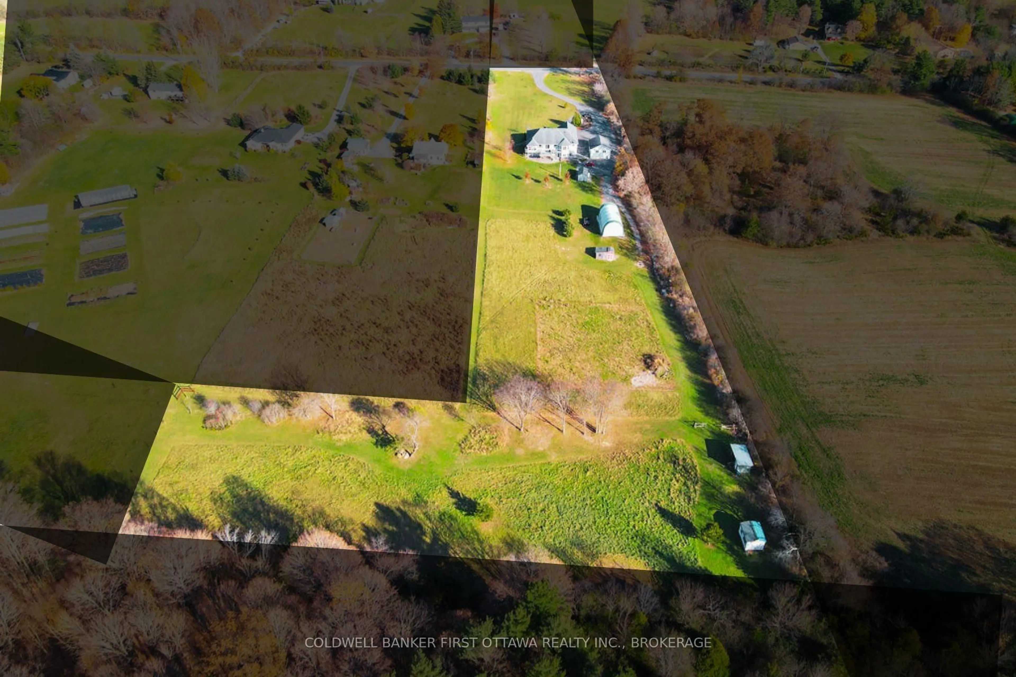 A pic from outside/outdoor area/front of a property/back of a property/a pic from drone, unknown for 4987 Bedford Rd, Picton Ontario K0K 2T0