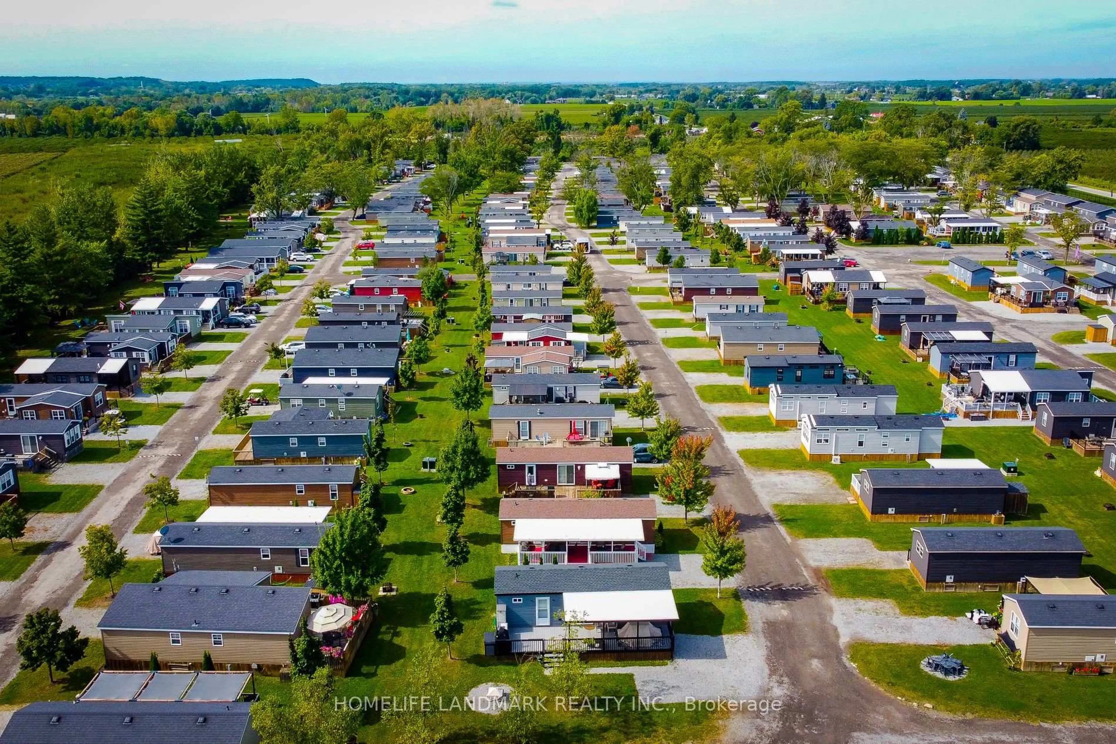 A pic from outside/outdoor area/front of a property/back of a property/a pic from drone, street for 1501 Line 8 Rd #232, Niagara-on-the-Lake Ontario L0S 1L0