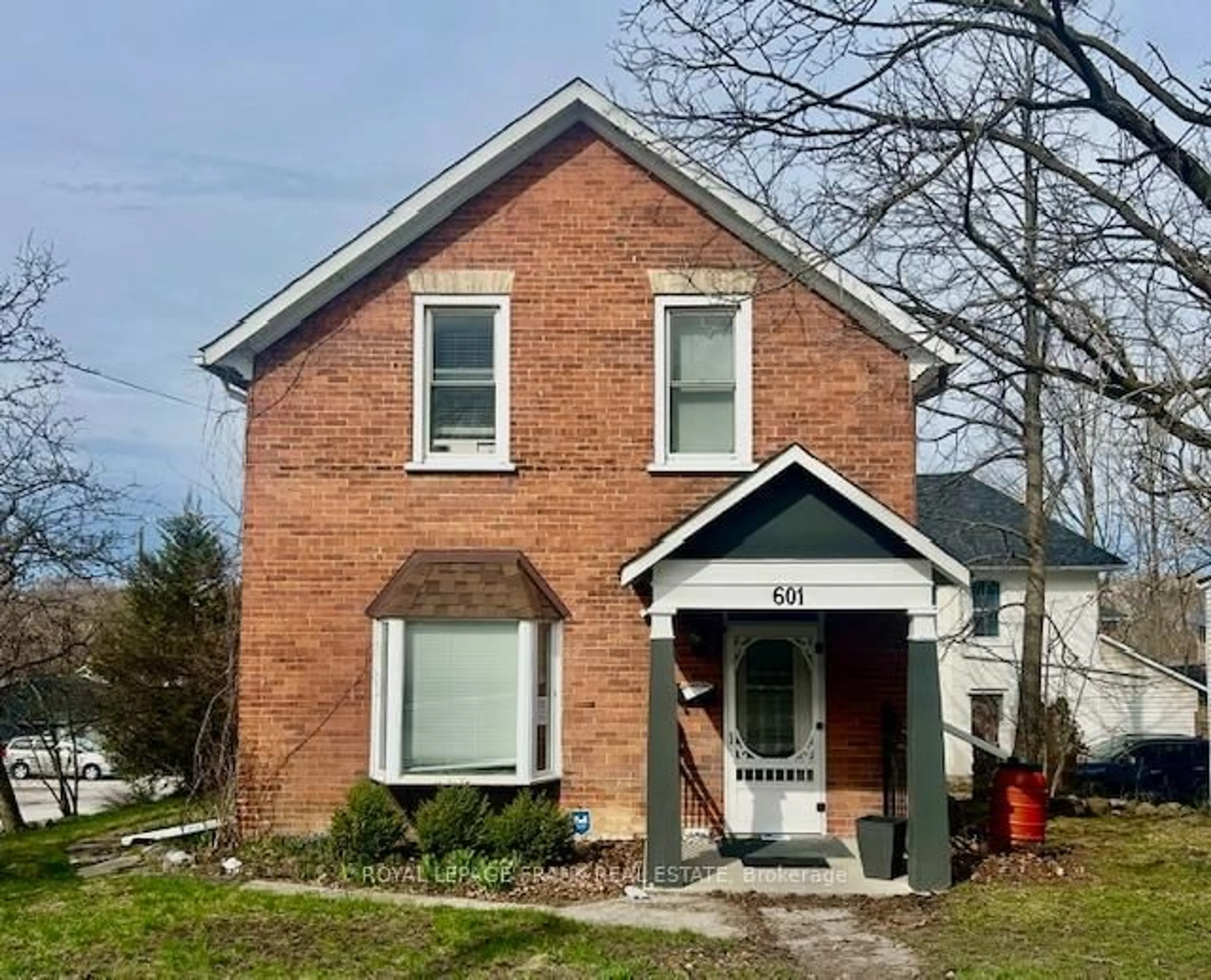 Home with brick exterior material, street for 601 Rubidge St, Peterborough Ontario K9H 4E9