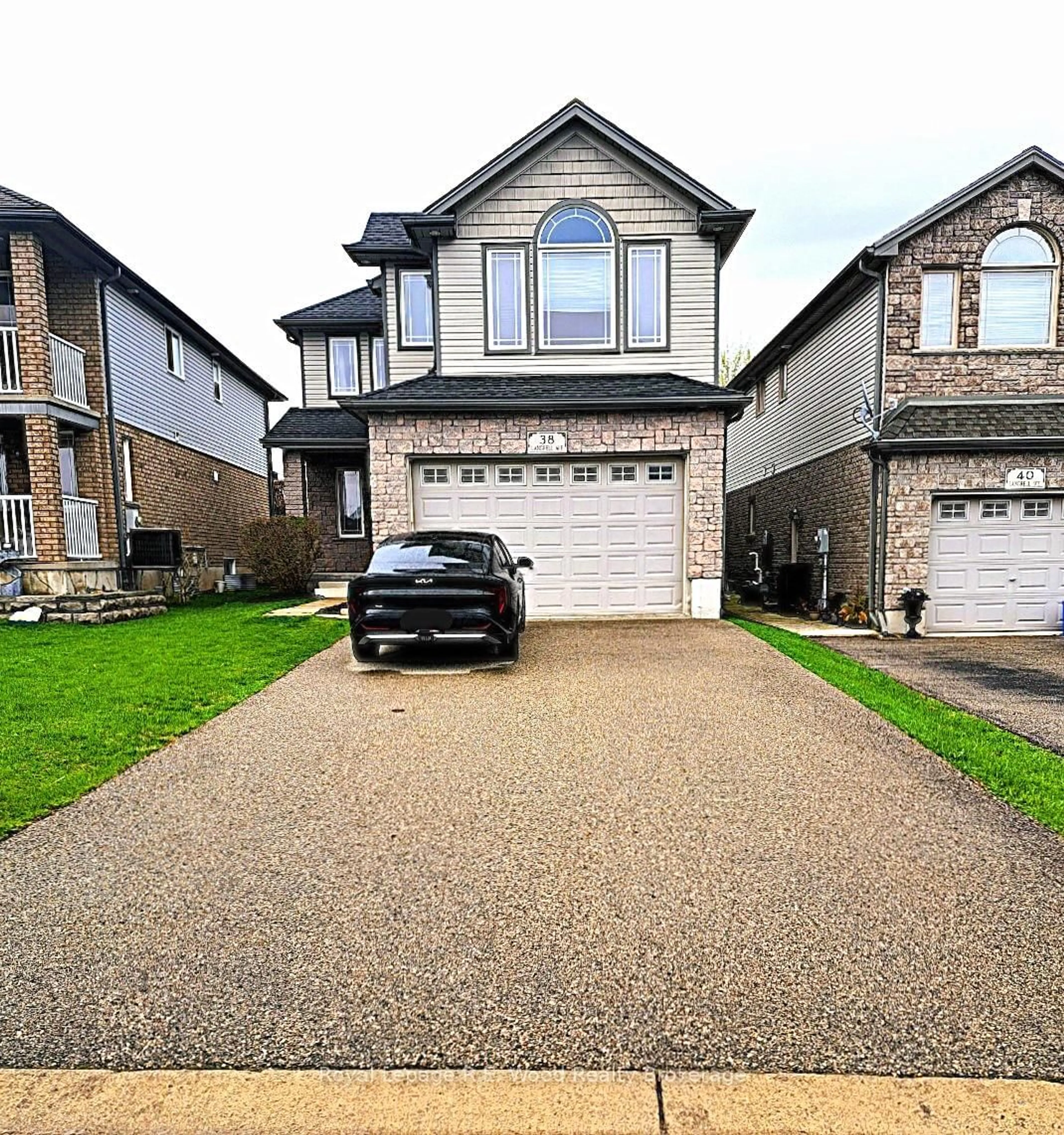 Home with vinyl exterior material, street for 38 Langrell Ave, Tillsonburg Ontario N4G 5X8