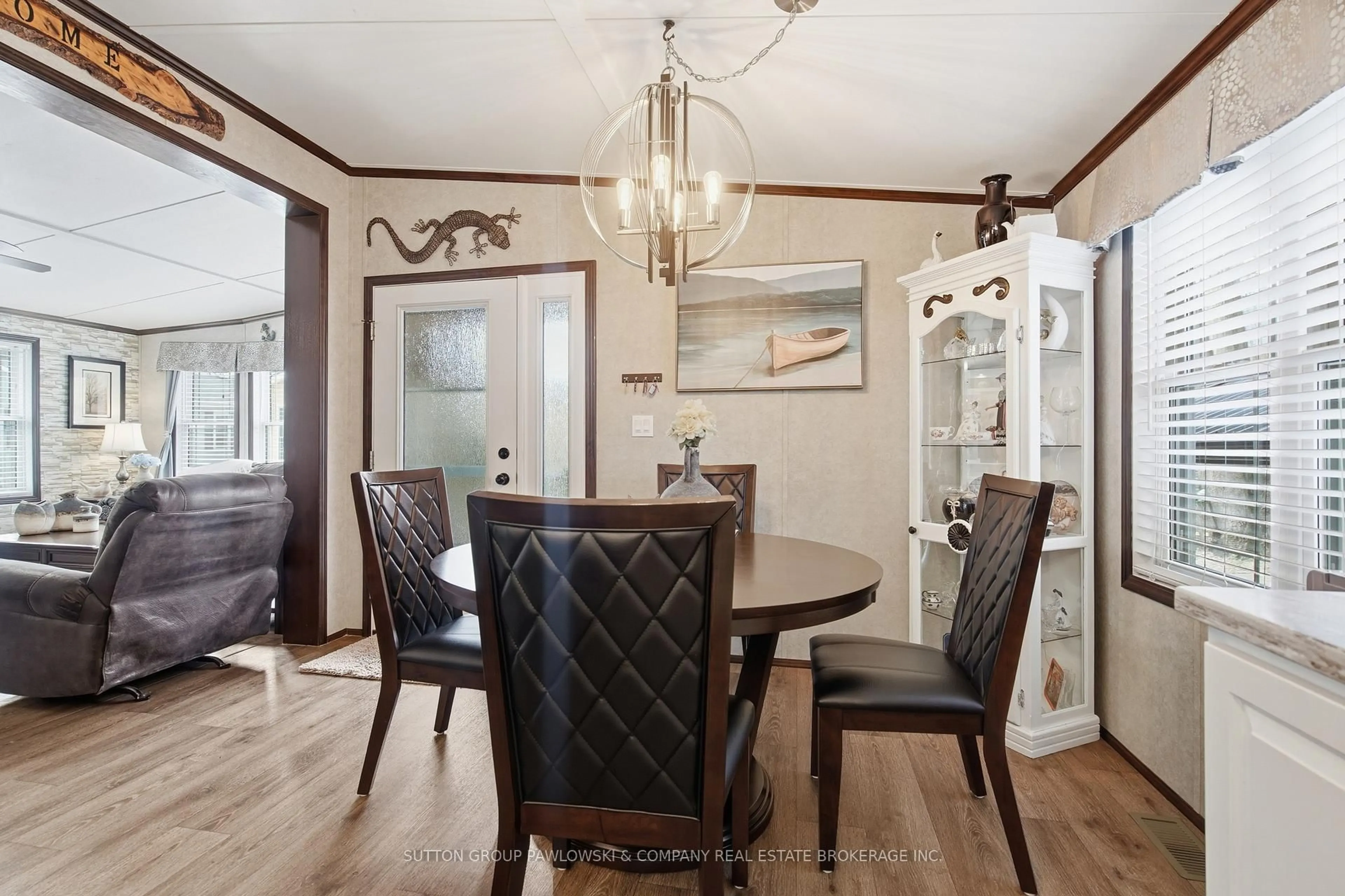 Dining room, wood/laminate floor for 22790 Amiens Rd #142, Middlesex Centre Ontario N0L 1R0