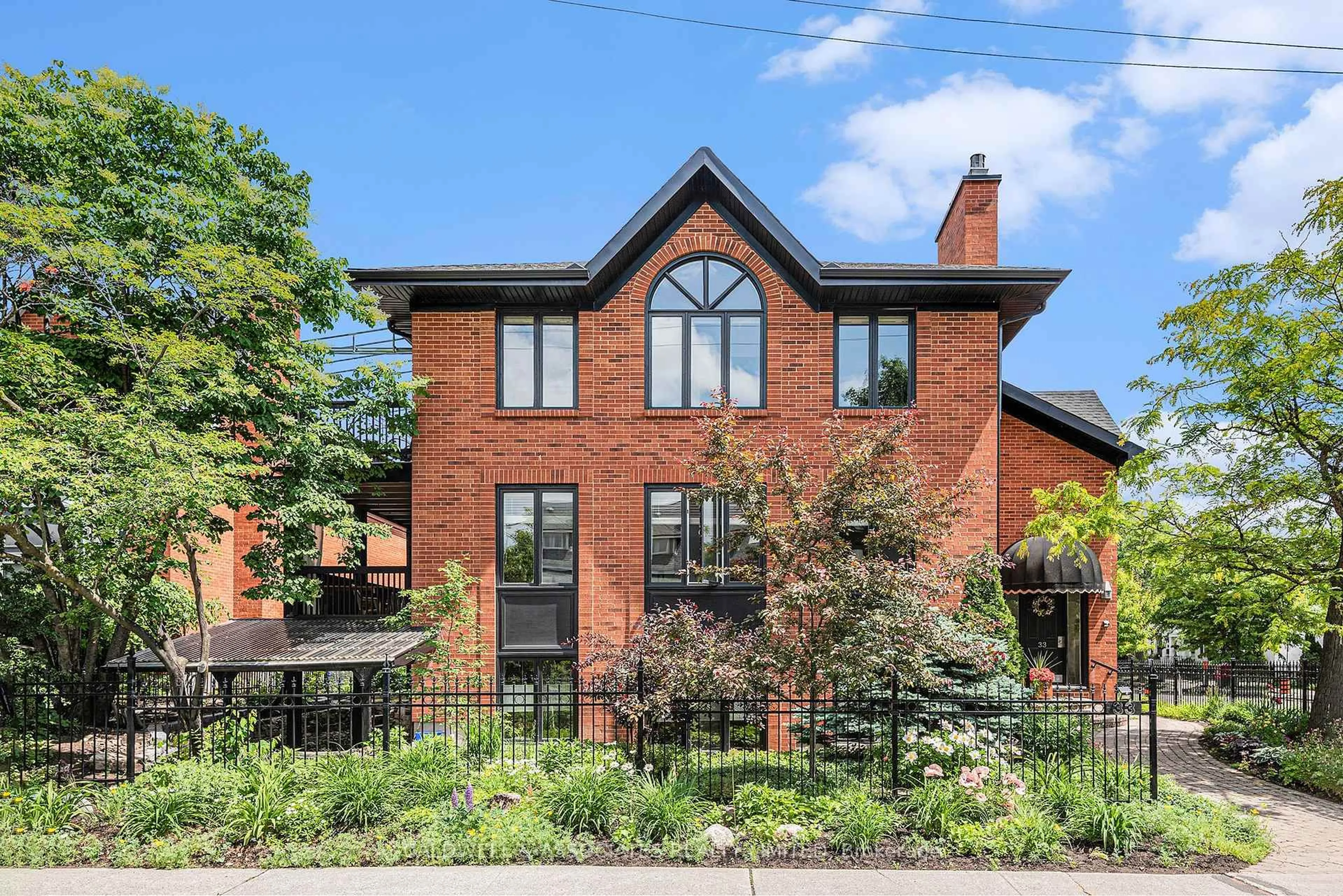 Home with brick exterior material, street for 33 Charles St #3, Ottawa Ontario K1M 1R3