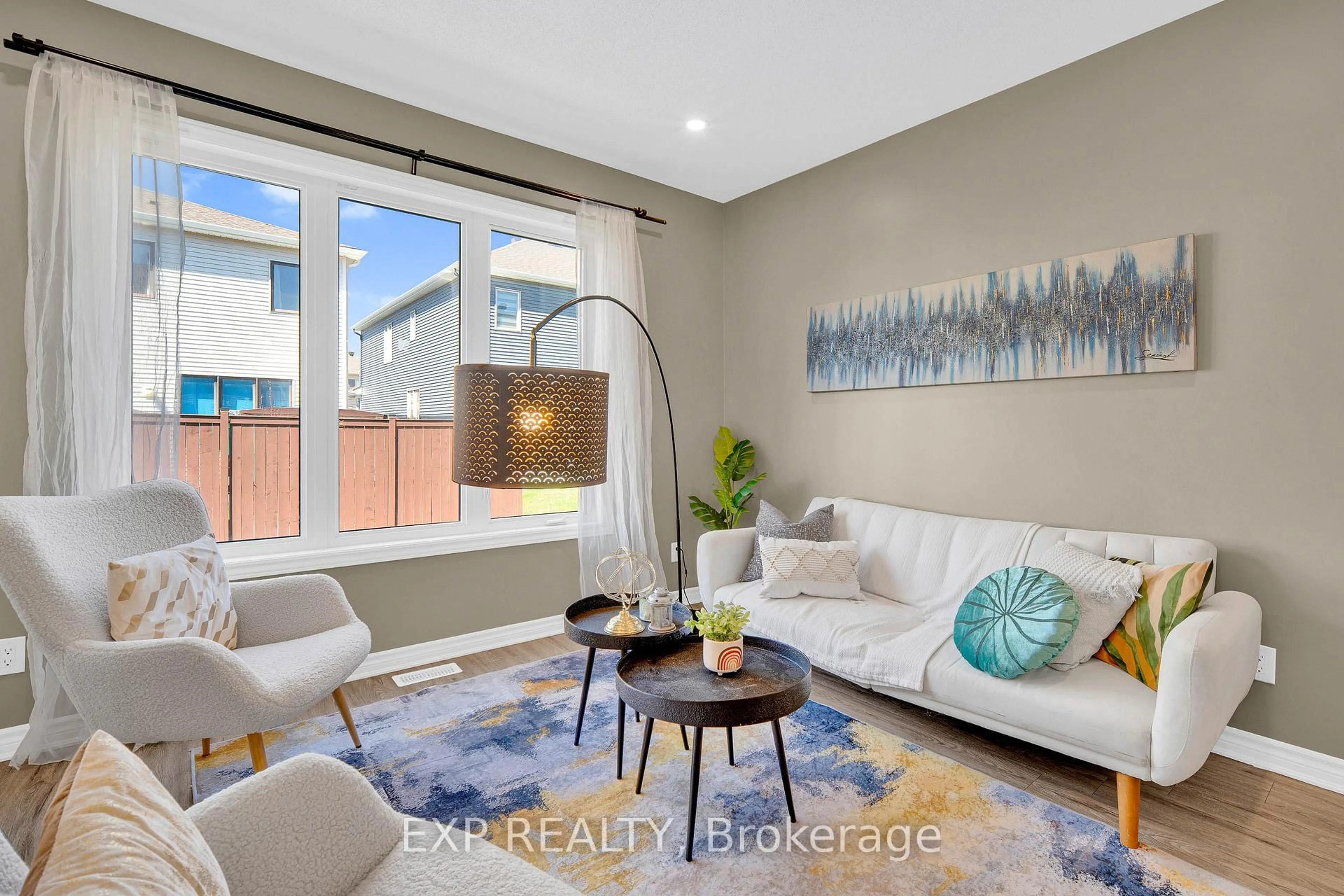 Living room with furniture, unknown for 215 Merak Way, Ottawa Ontario K2J 6N7