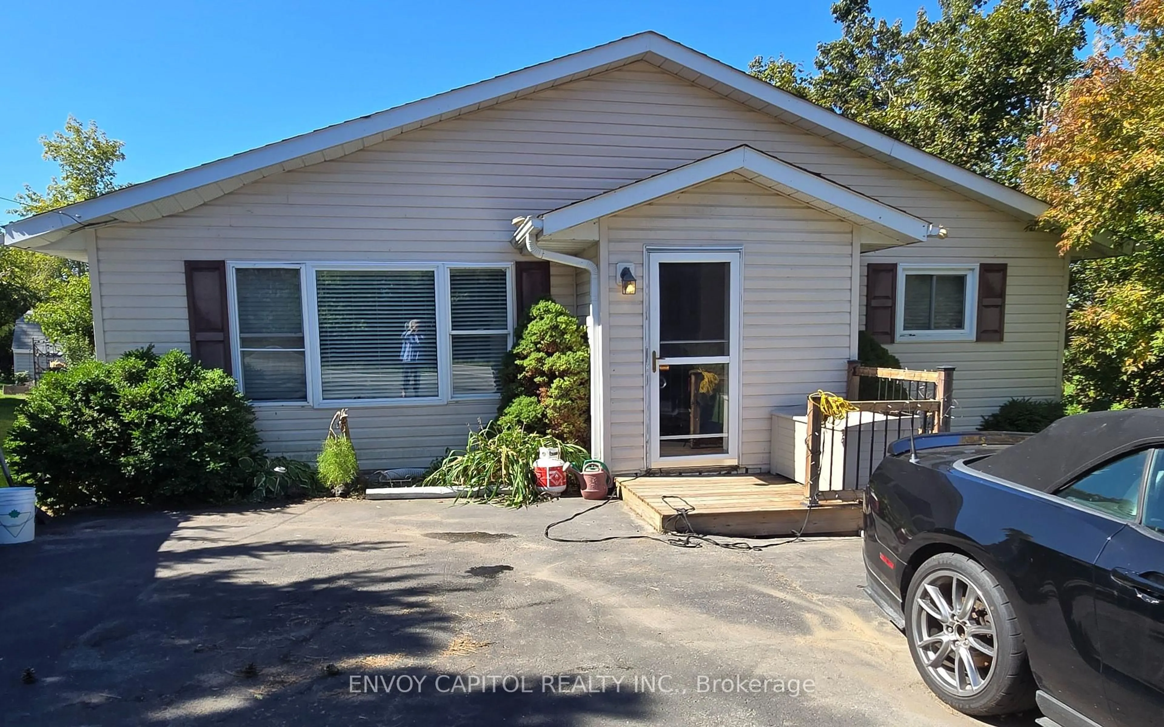 Home with vinyl exterior material, street for 2303 Thurstonia Rd, Kawartha Lakes Ontario K0M 1L0