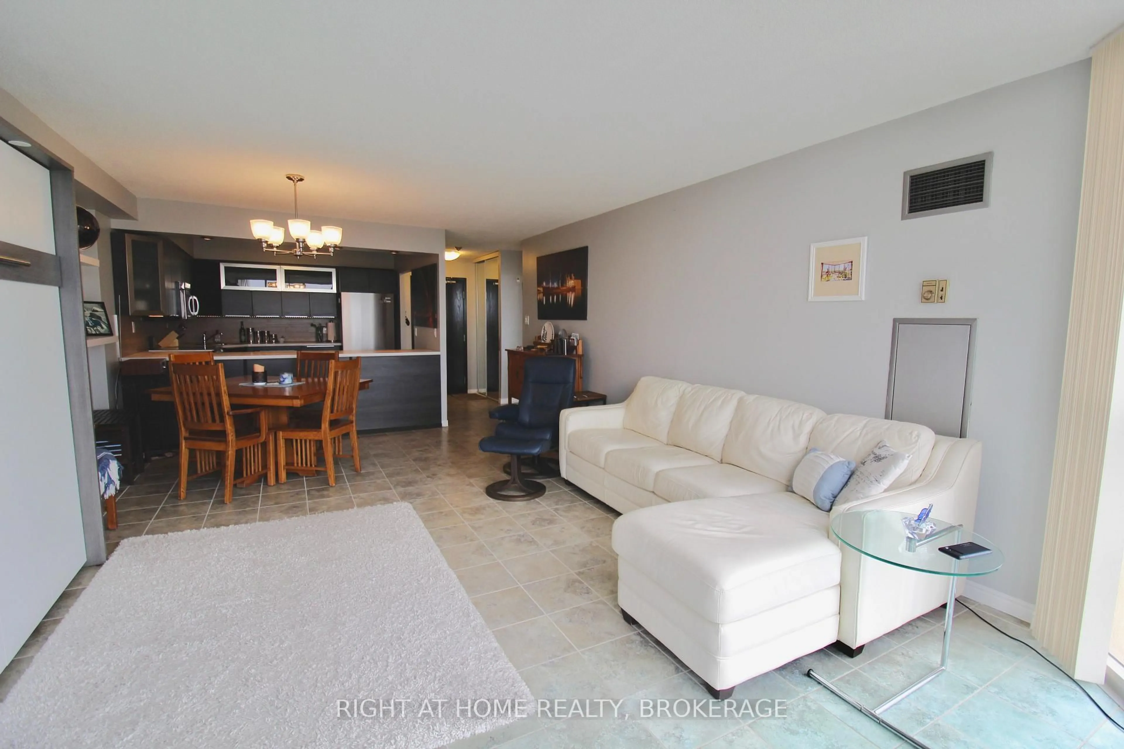 Living room with furniture, unknown for 162 Martindale Rd #801, St. Catharines Ontario L2S 3S4