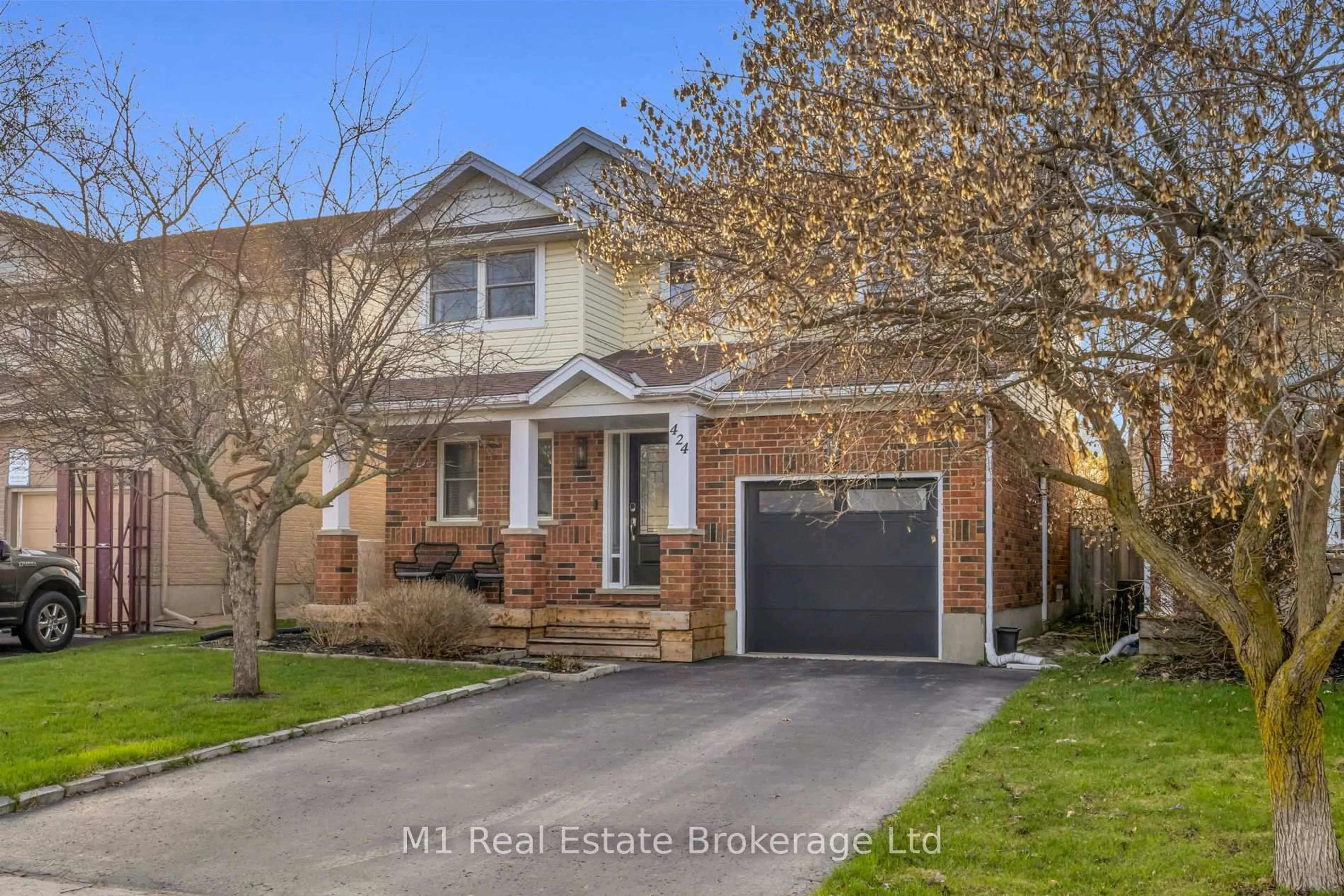 Home with brick exterior material, street for 424 MILLBURN Blvd, Centre Wellington Ontario N1M 3R5
