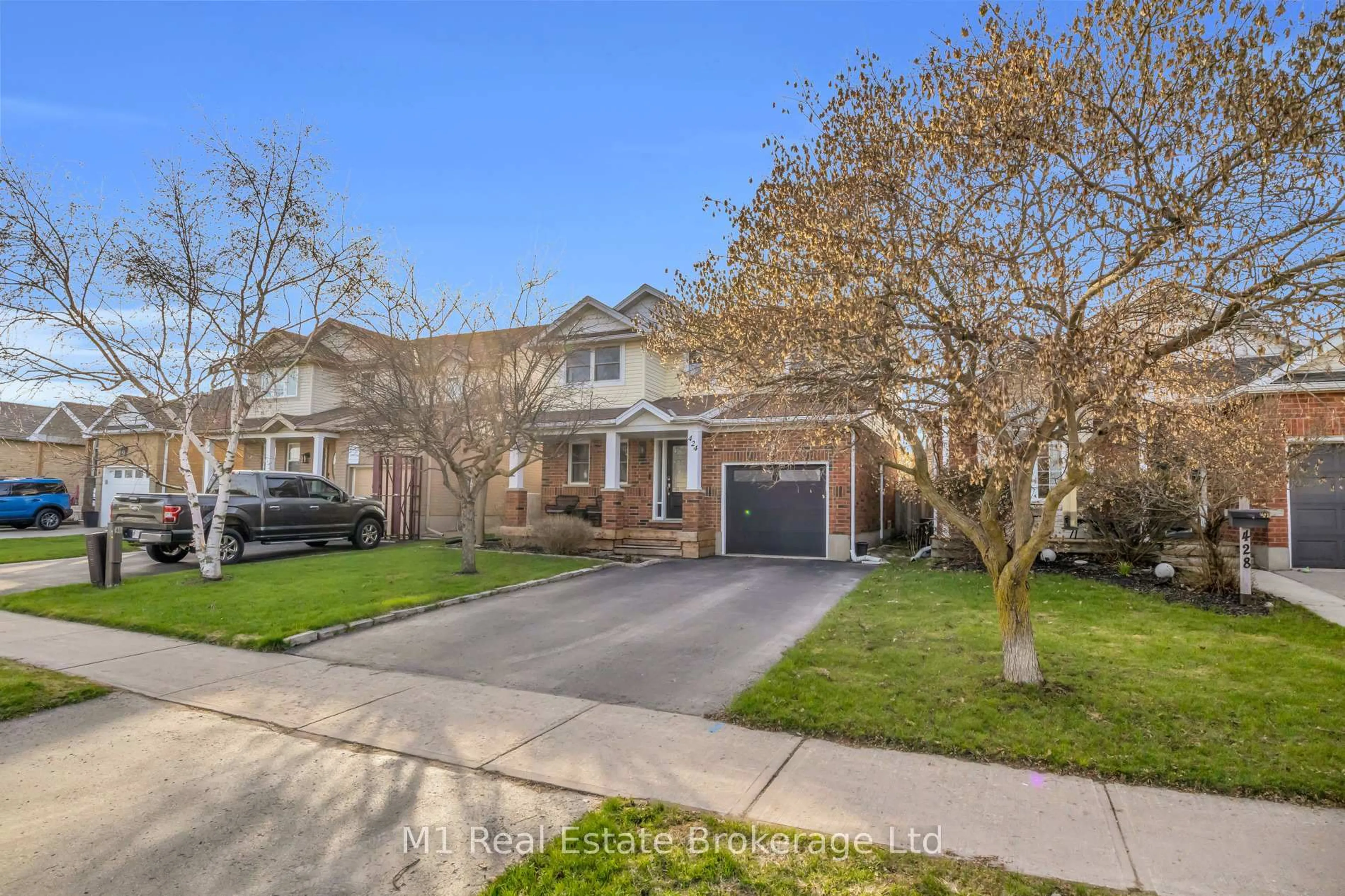 Home with brick exterior material, street for 424 MILLBURN Blvd, Centre Wellington Ontario N1M 3R5