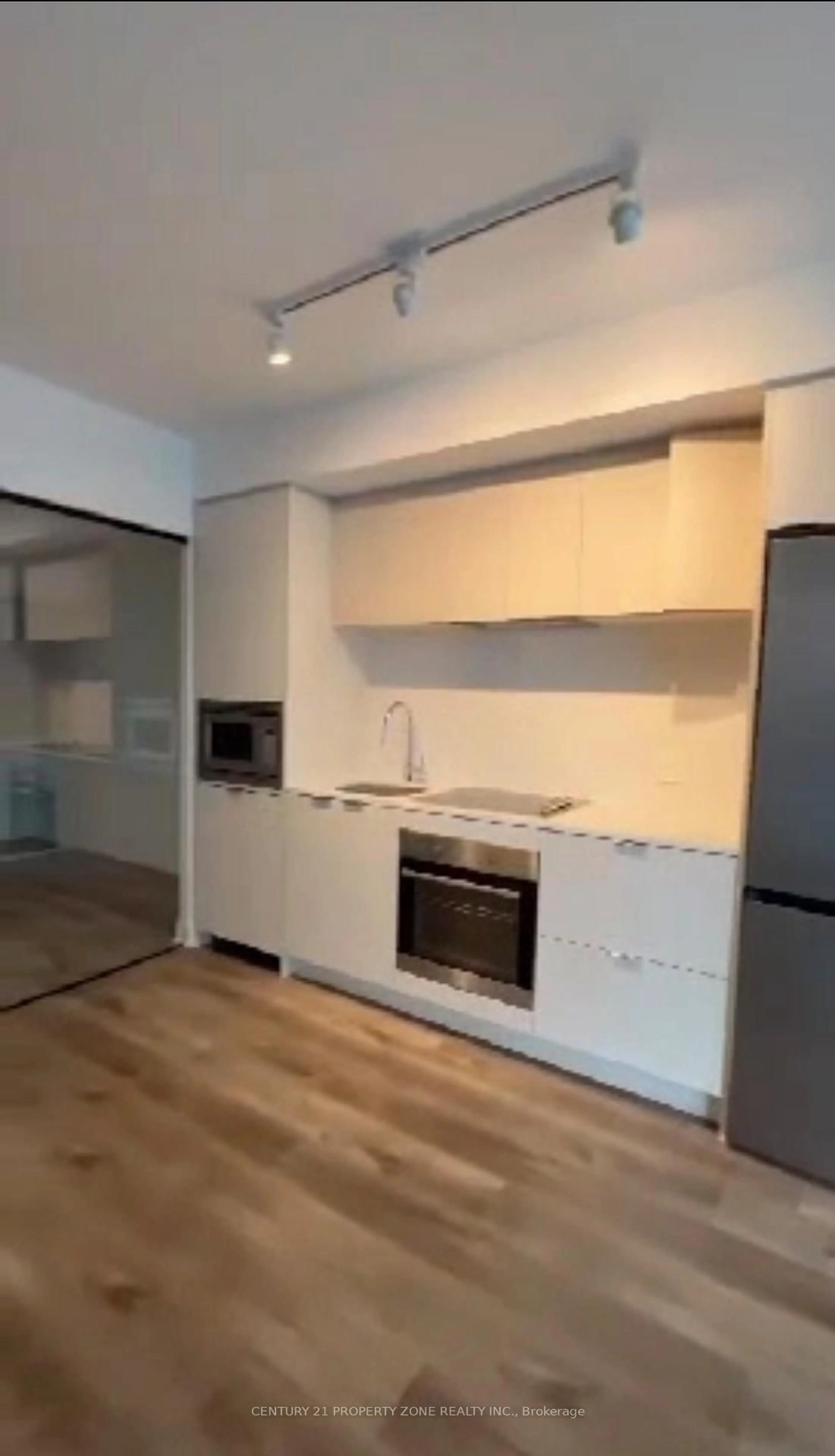 Standard kitchen, wood/laminate floor for 1 Jarvis St #1019, Hamilton Ontario L8R 3J2