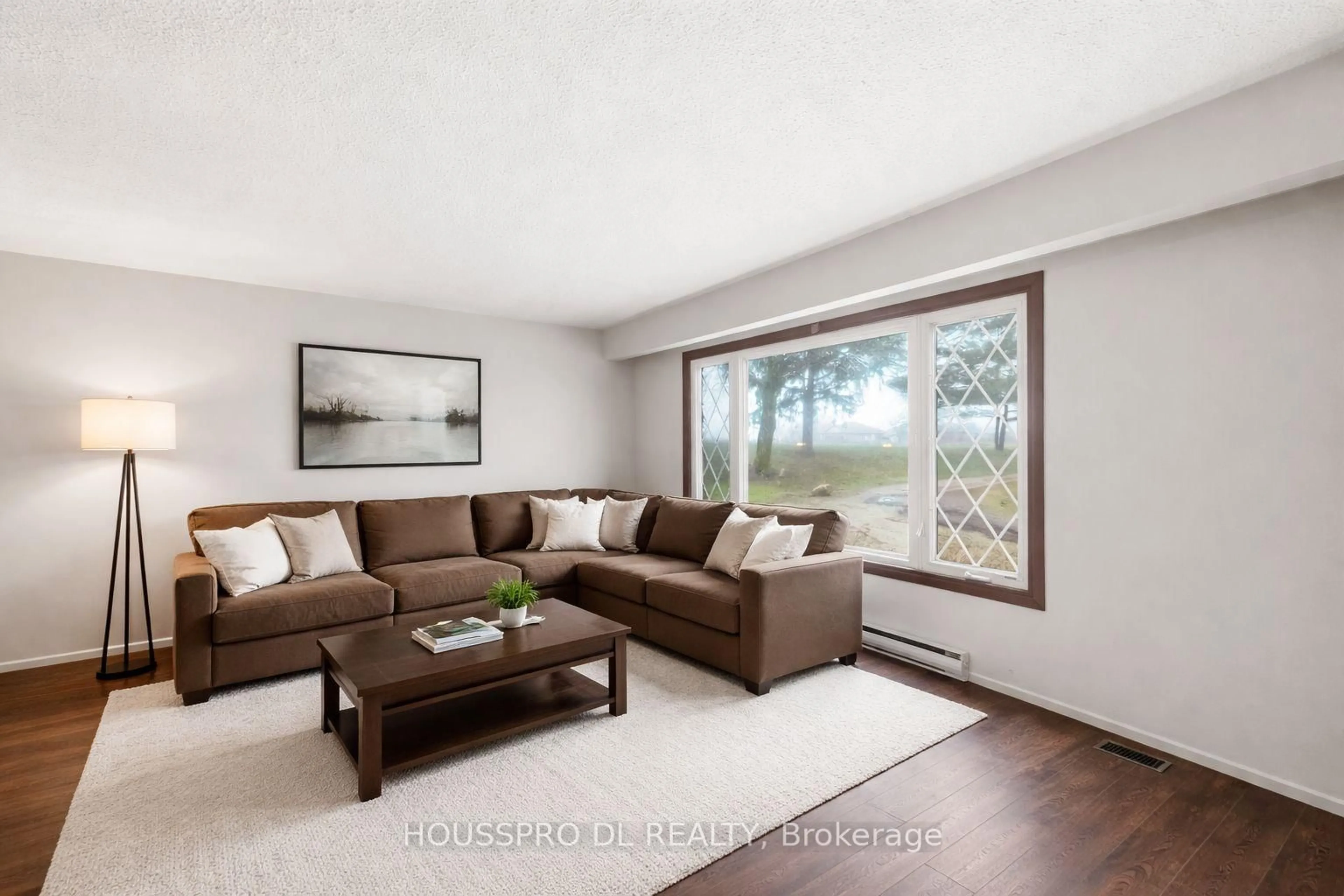 Living room with furniture, wood/laminate floor for 7357 Wellington Rd 30, Guelph/Eramosa Ontario N1H 6J2