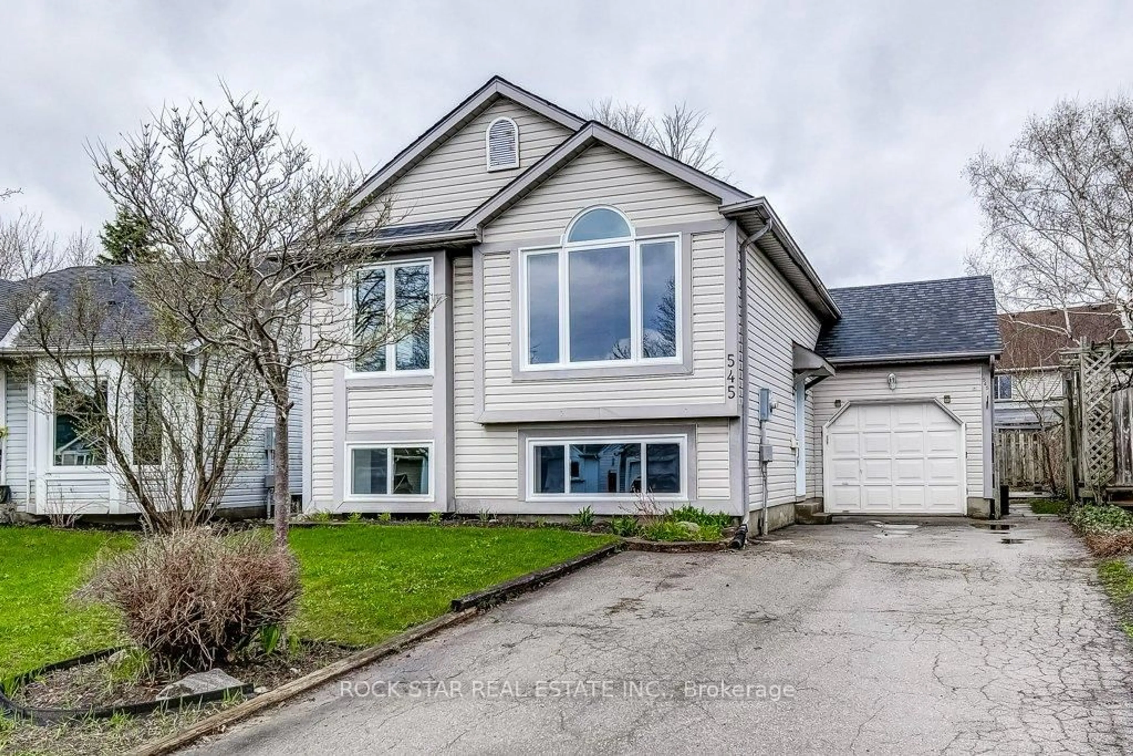 Home with vinyl exterior material, street for 545 Trico Dr, Cambridge Ontario N3H 5M7