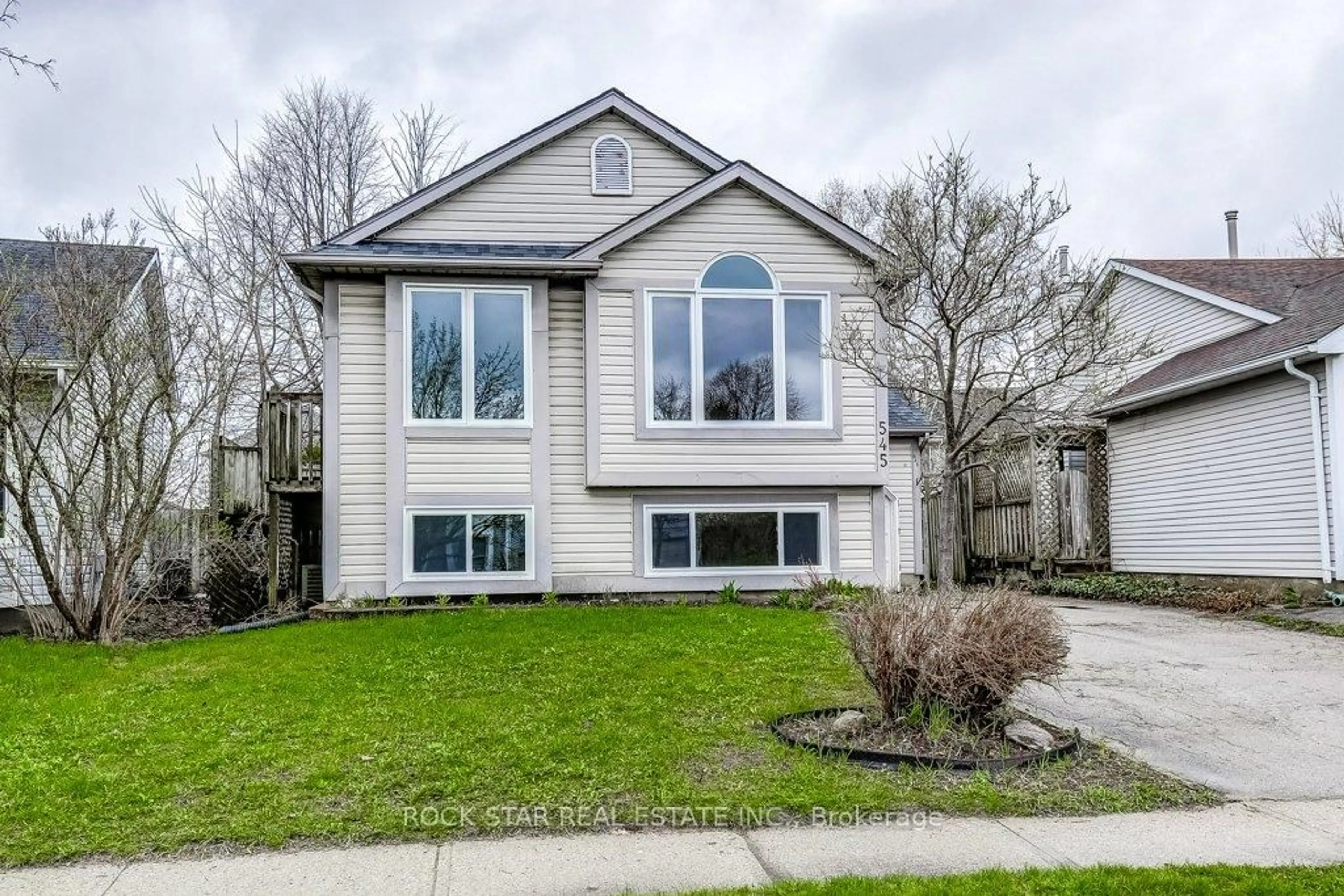 Home with vinyl exterior material, street for 545 Trico Dr, Cambridge Ontario N3H 5M7