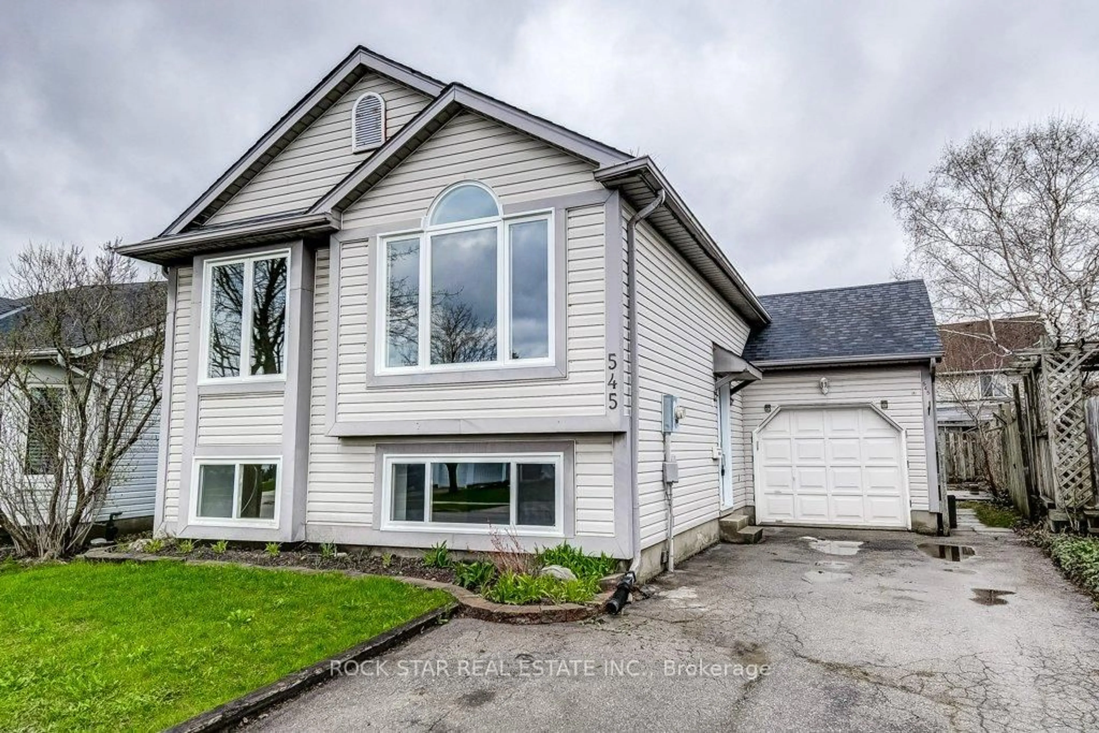 Home with vinyl exterior material, street for 545 Trico Dr, Cambridge Ontario N3H 5M7