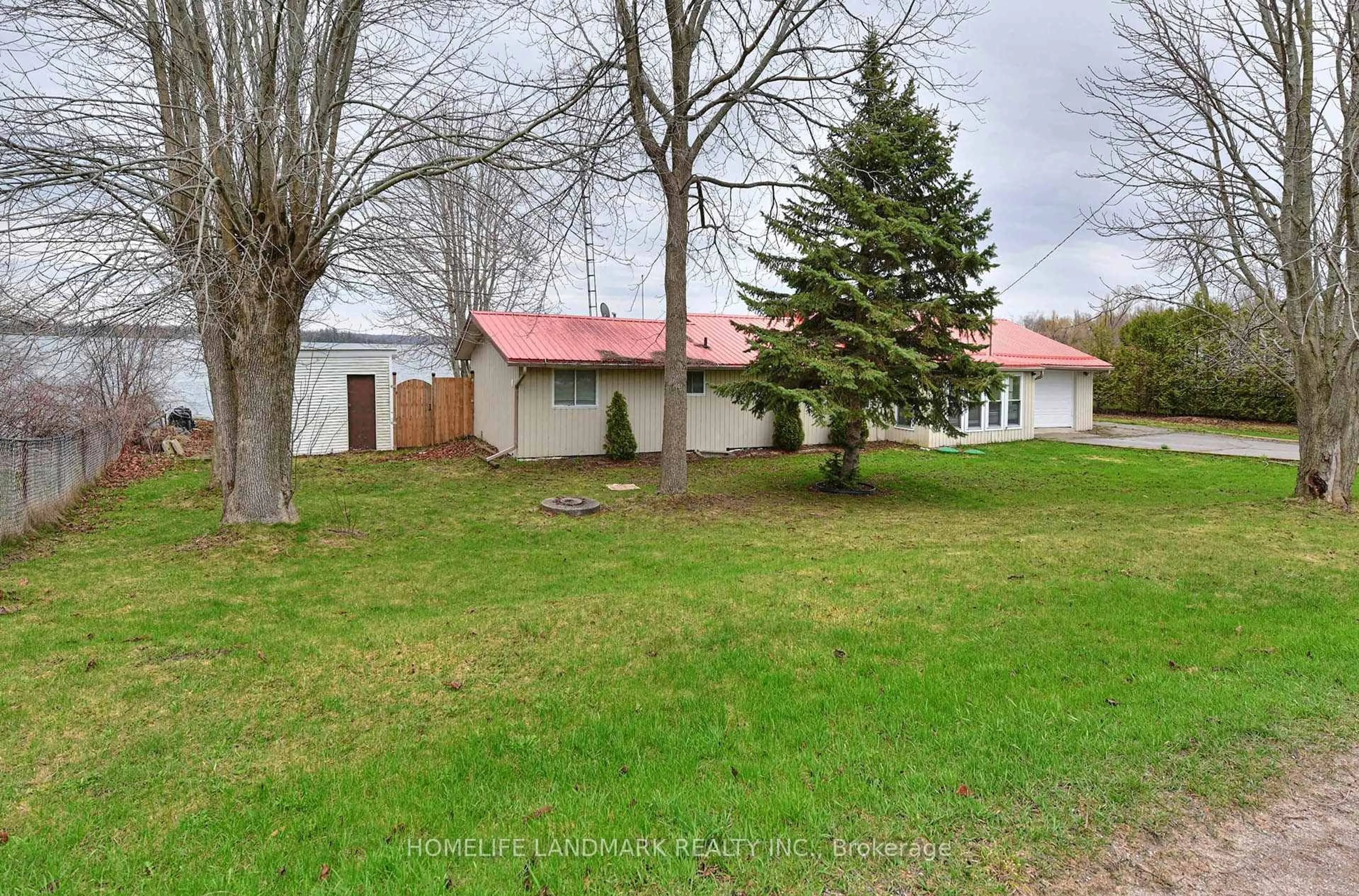 A pic from outside/outdoor area/front of a property/back of a property/a pic from drone, street for 197 Washburn Island Rd, Kawartha Lakes Ontario K0M 2C0