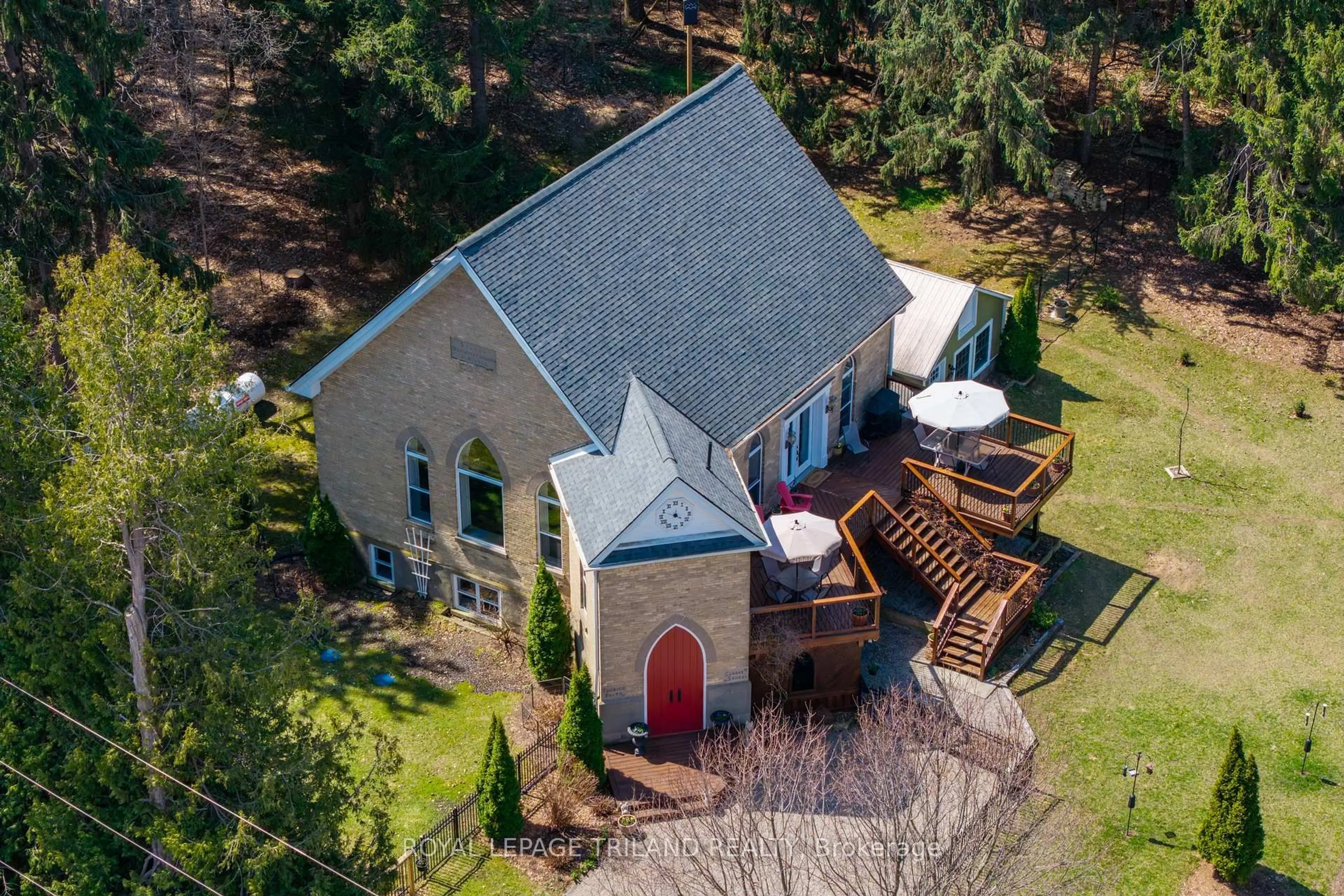 A pic from outside/outdoor area/front of a property/back of a property/a pic from drone, unknown for 32135 Sylvan Rd, North Middlesex Ontario N0M 2K0