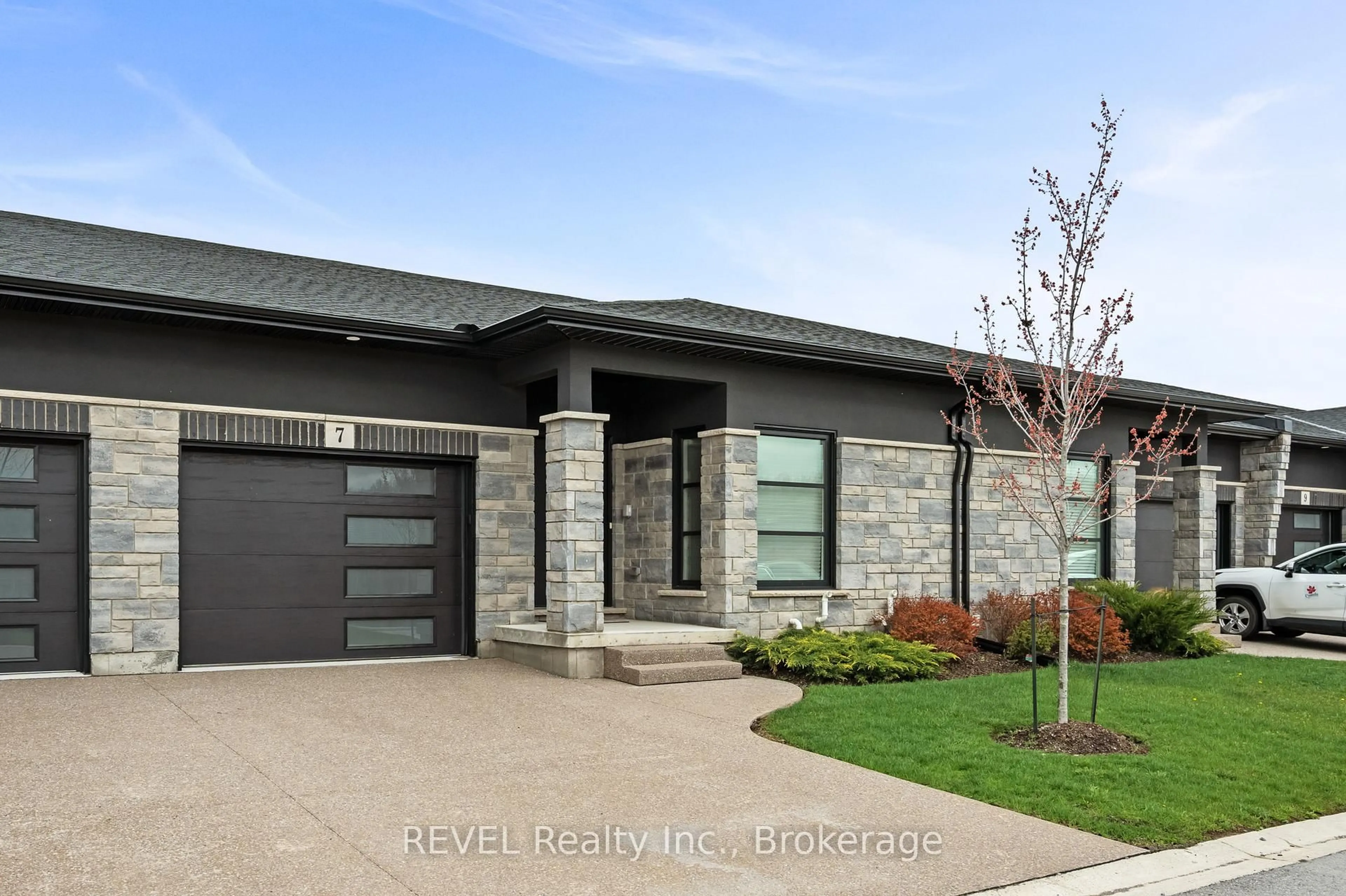 Home with brick exterior material, street for 7138 PARSA St #7, Niagara Falls Ontario L2H 3W1