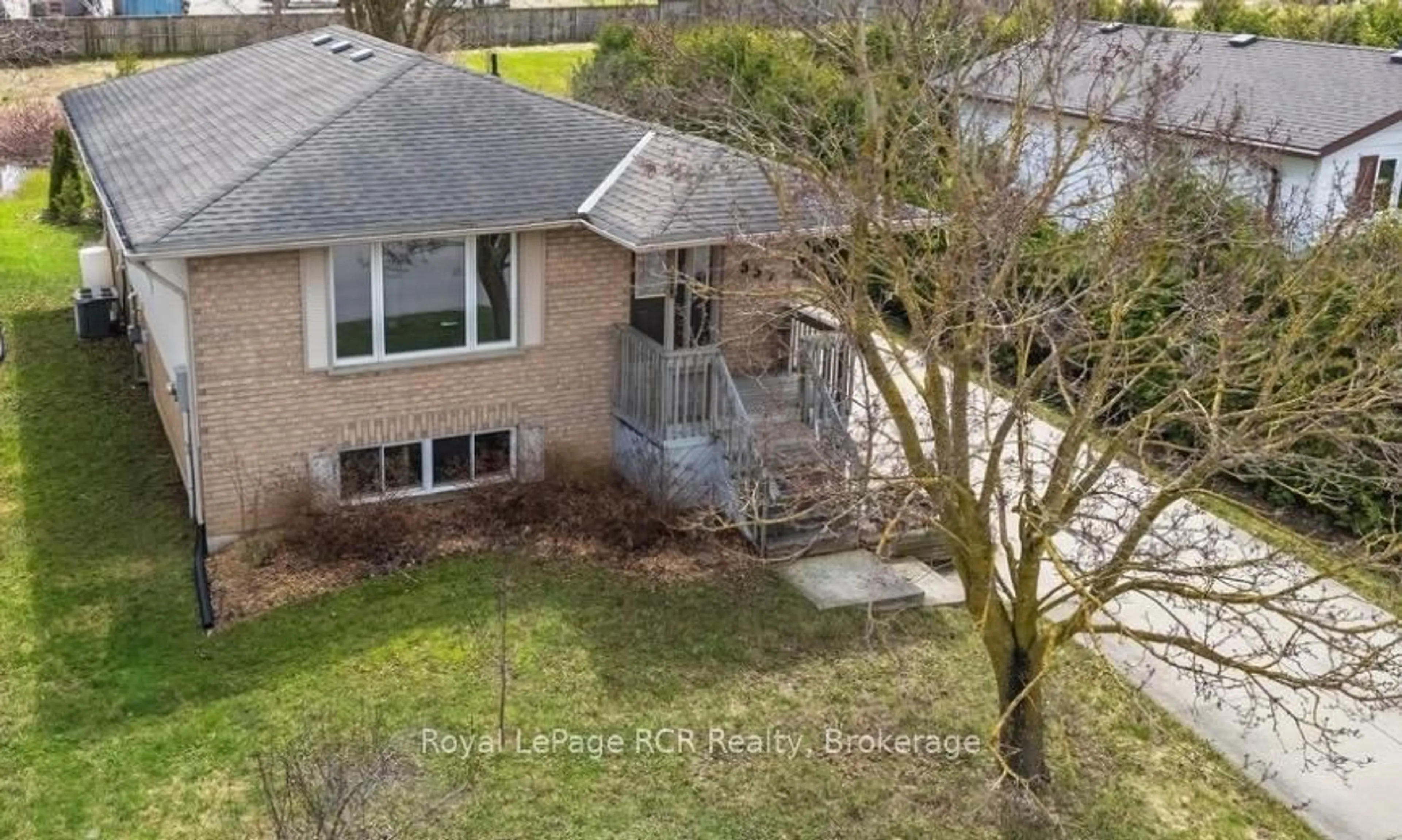 A pic from outside/outdoor area/front of a property/back of a property/a pic from drone, unknown for 557 2nd A St, Hanover Ontario N4N 3P6