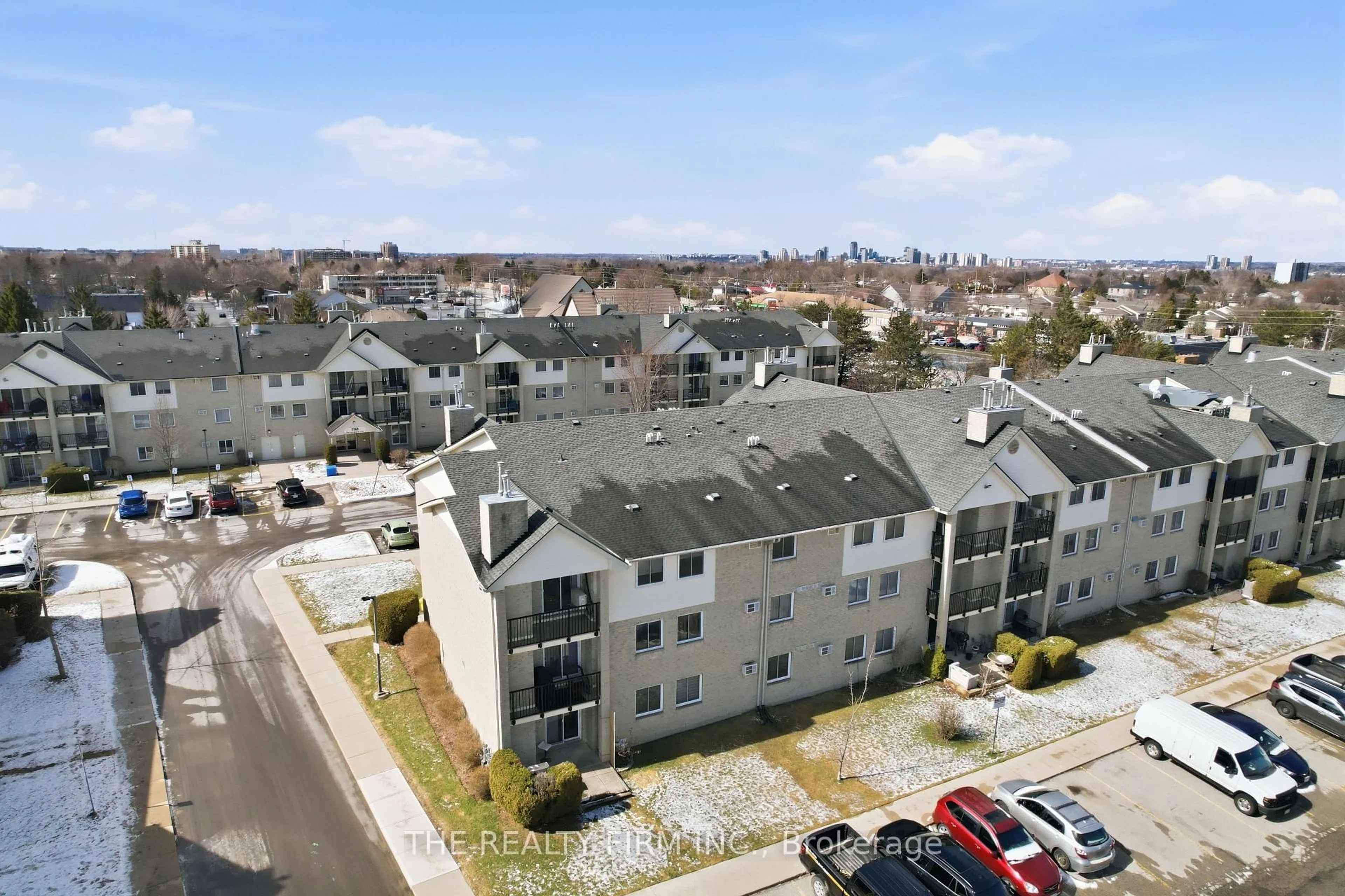 A pic from outside/outdoor area/front of a property/back of a property/a pic from drone, city buildings view from balcony for 735 Deveron Cres #310, London South Ontario N5Z 4X8