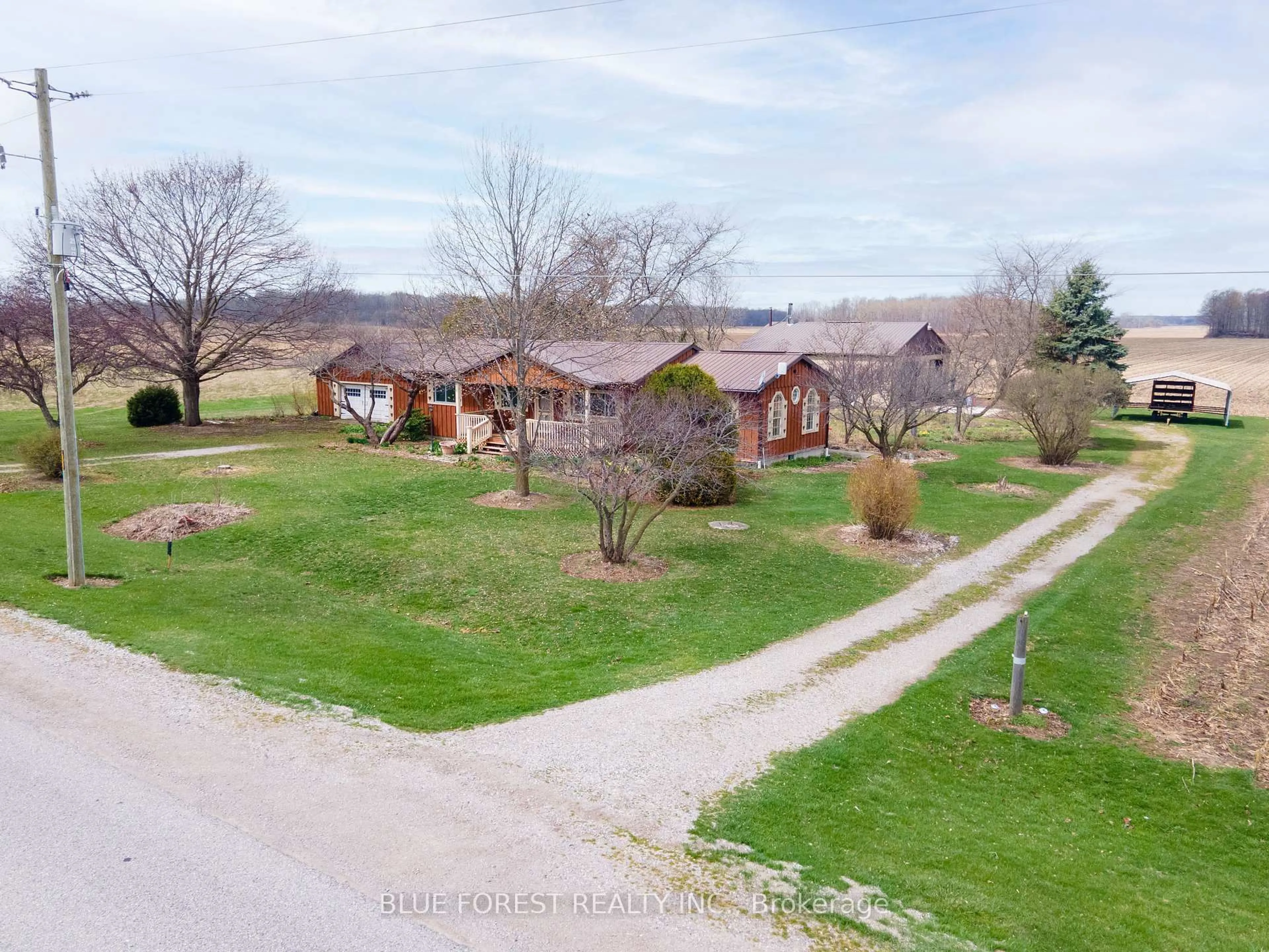 A pic from outside/outdoor area/front of a property/back of a property/a pic from drone, unknown for 21698 Johnston Line, West Elgin Ontario N0L 2N0