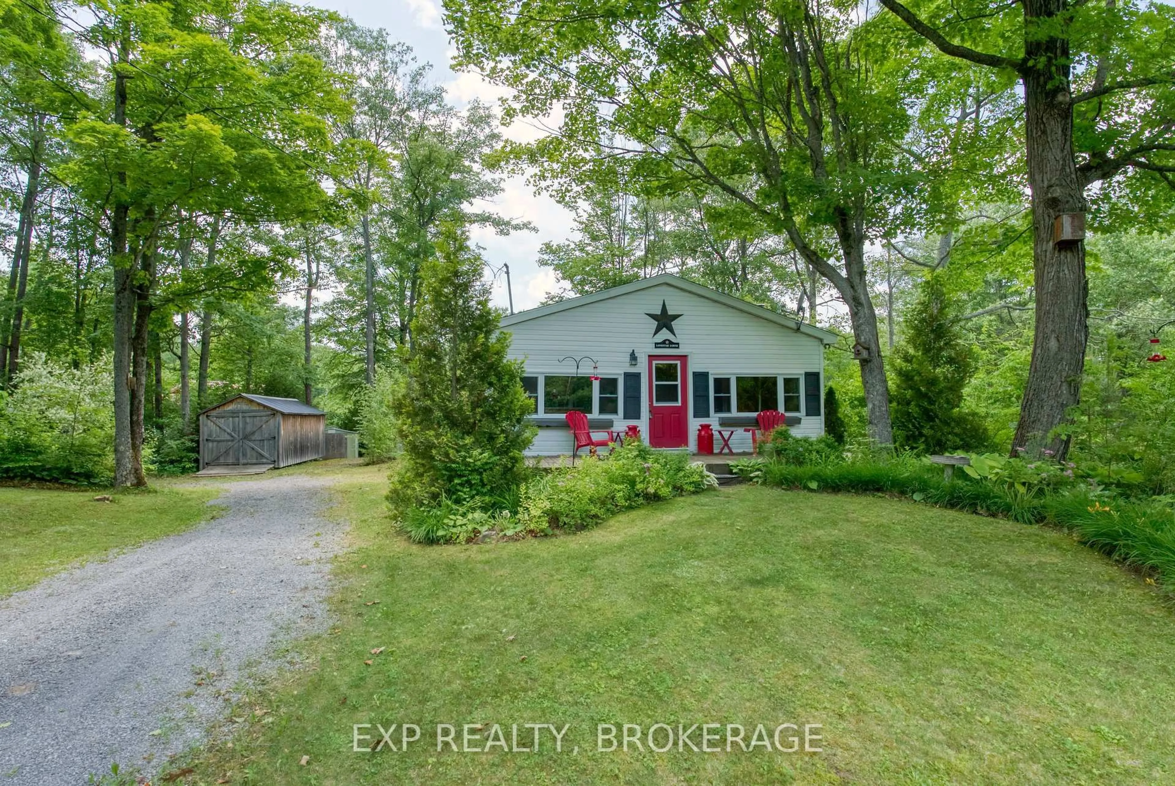 A pic from outside/outdoor area/front of a property/back of a property/a pic from drone, street for 1036 Lakeshore Rd, Arden Ontario K0H 1B0